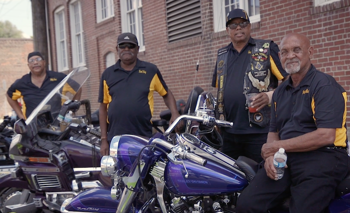 Earl pictured (right) with other members of the Rough Riders