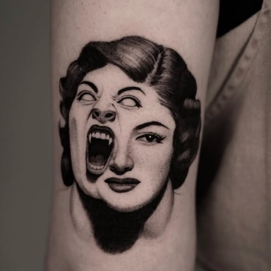 Realistic dual-expression portrait tattoo by Brian Parrillo, fine line realism in Durham