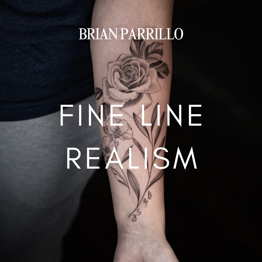 A detailed black and white floral tattoo on an arm, featuring a large rose, smaller flowers, and leaves with fine line work.
