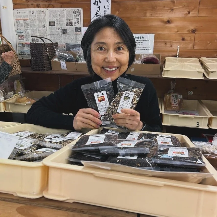 Michiko with bags of beans.jpeg