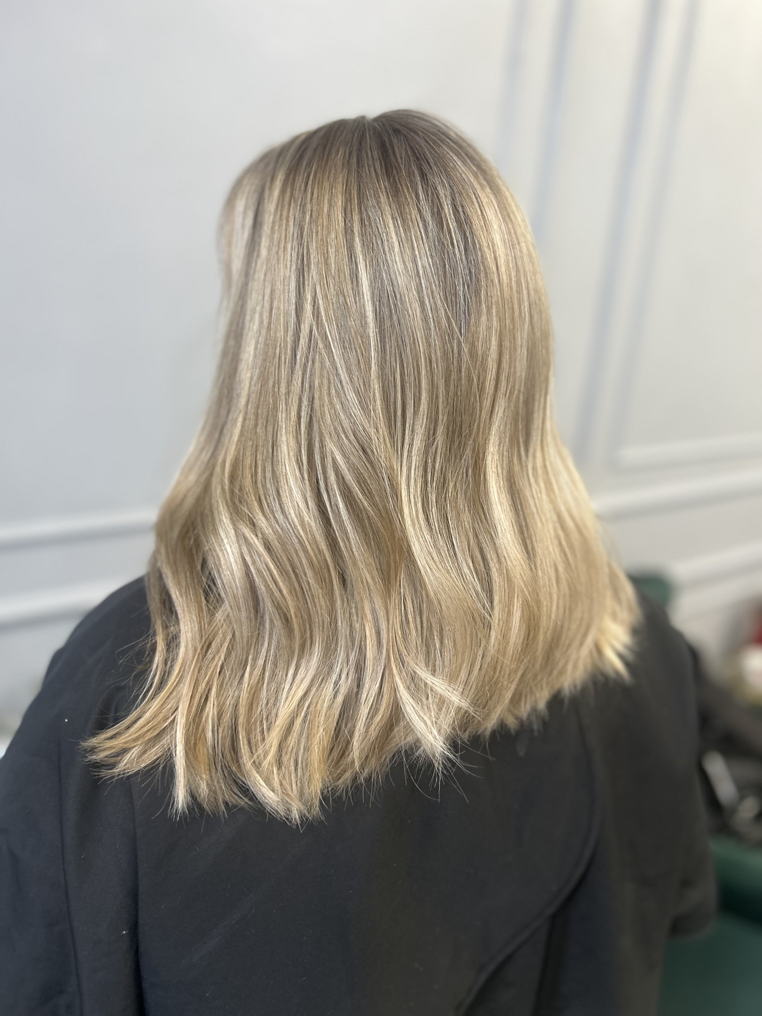Blonde balayage with soft waves by CS London HairShine in Mill Hill, London