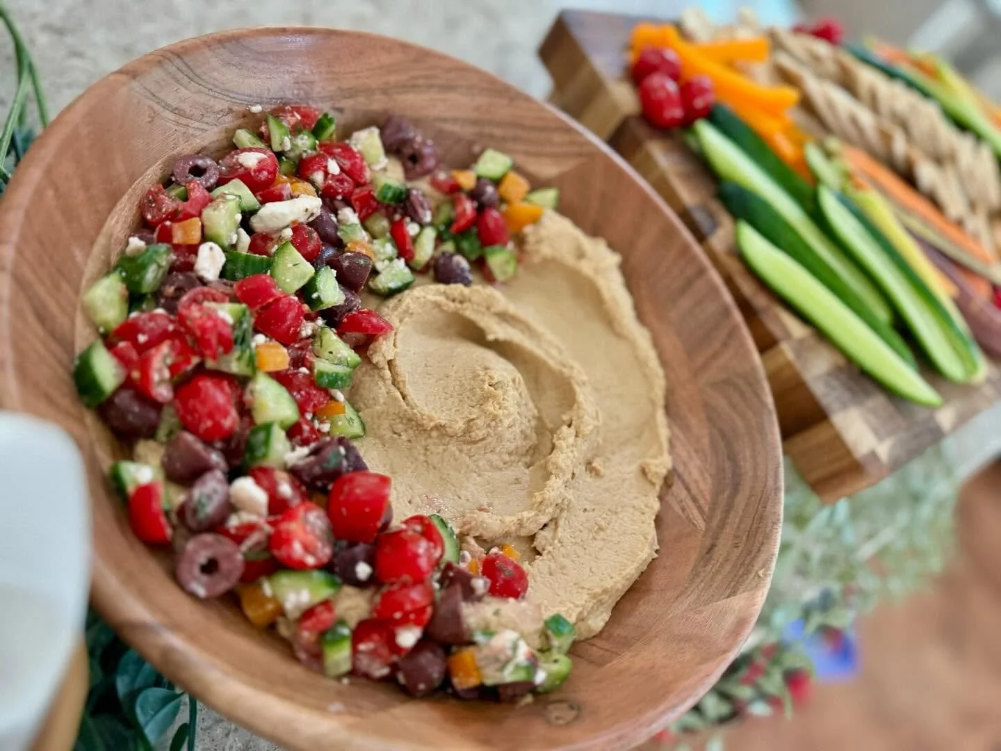 House made hummus loaded with a fresh Greek salad mix 🍅