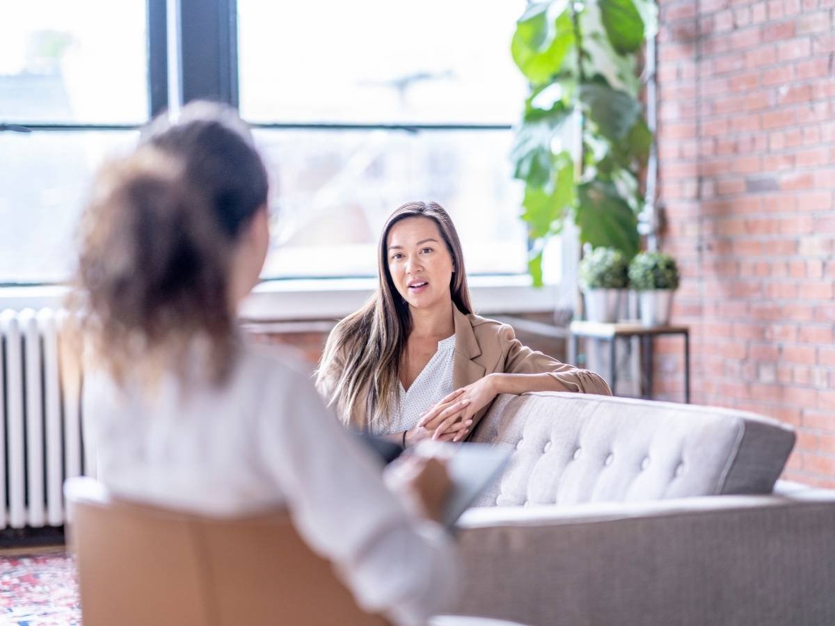 Girl talking to therapist about travel anxiety and bipolar.