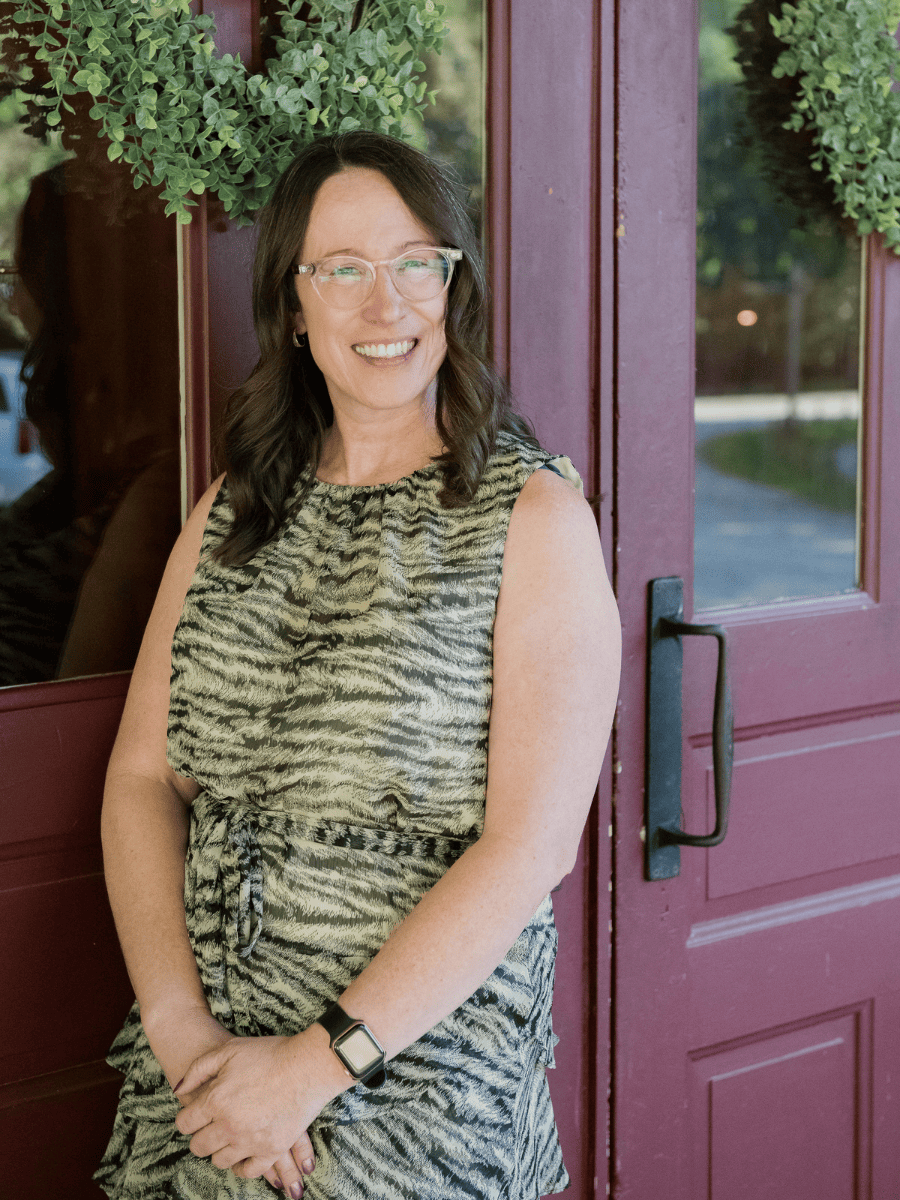 Emily Mendez, founder of Thriving With Bipolar, smiling outdoors