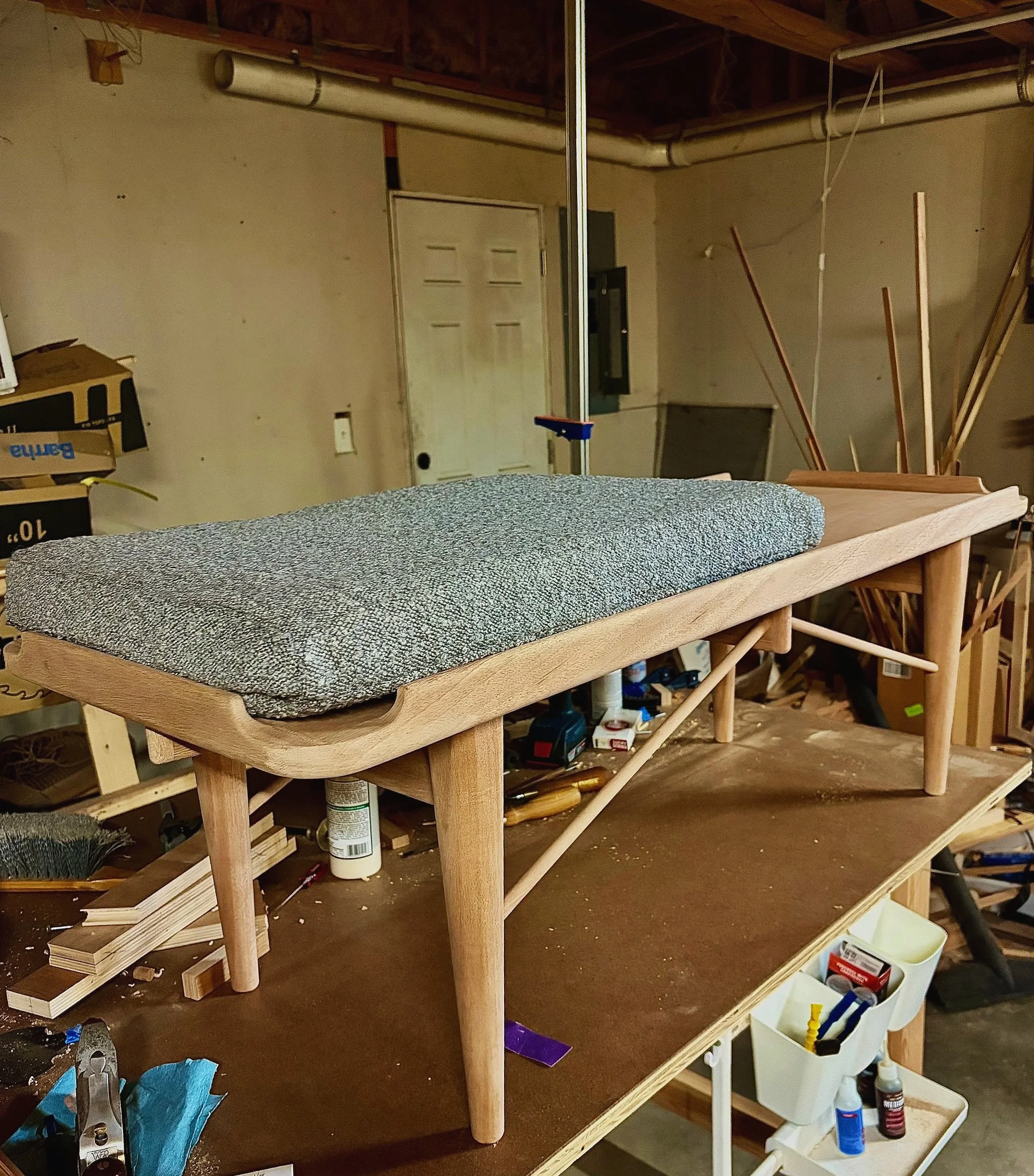 new bench in progress, upholstering different cushion options, coming soon