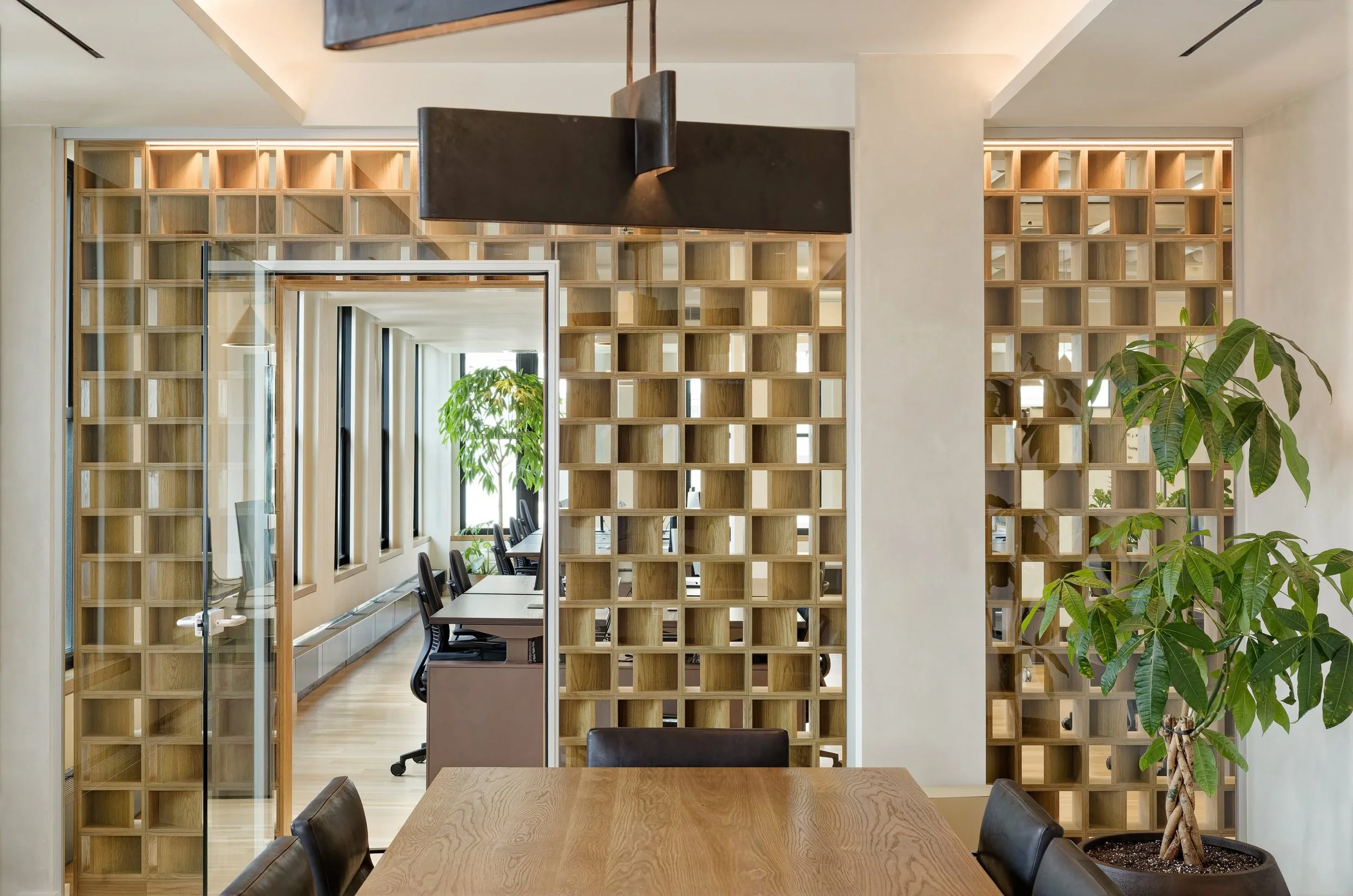 Openwork wood wall and glass entry, creative direction by Renee Labbe, 20000 SF Soho office interior, Bell Design Group