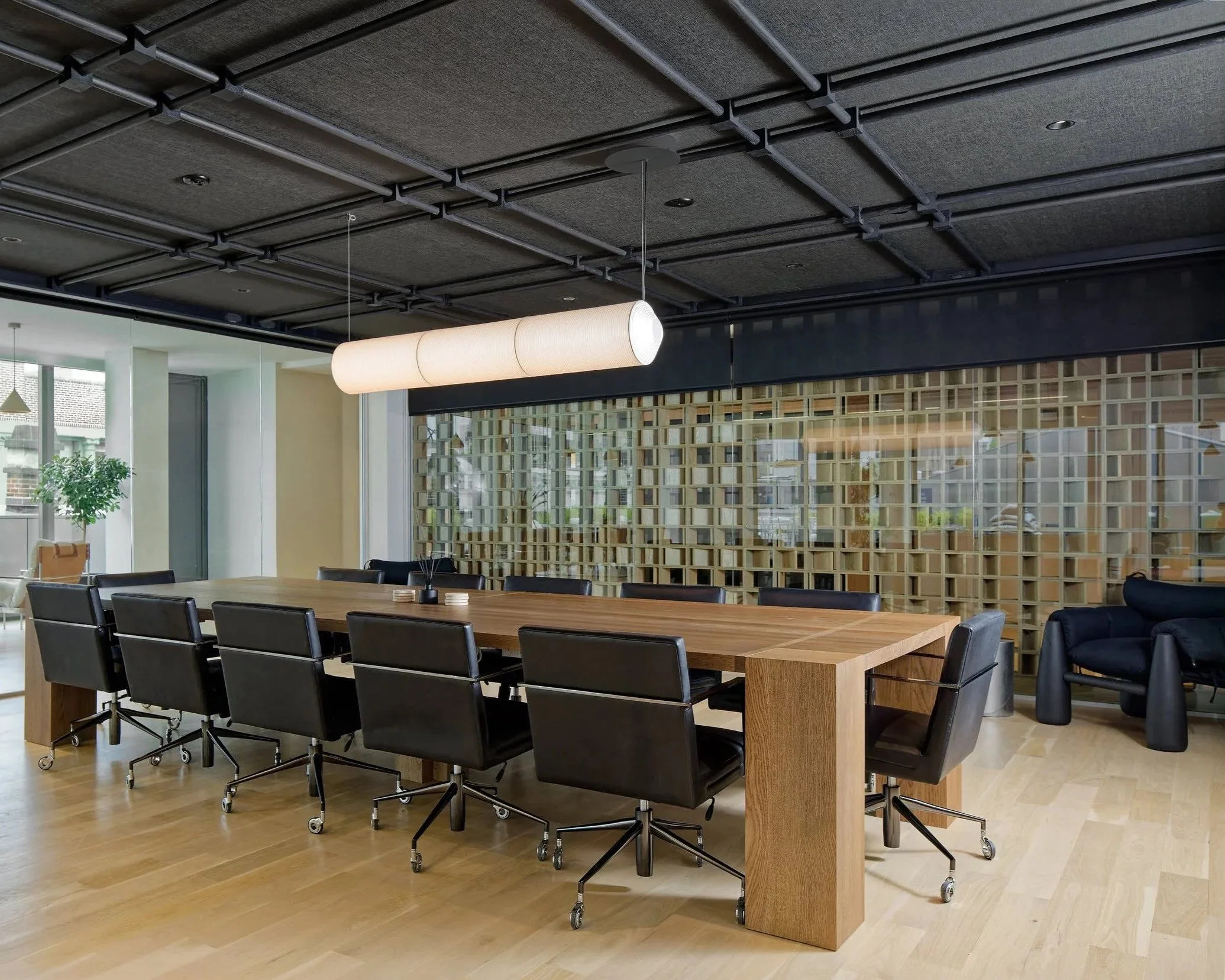 Japanese minimalist conference room with openwork wood wall, Soho commercial interior, Renee Labbe Design Futures, Bell Design Group