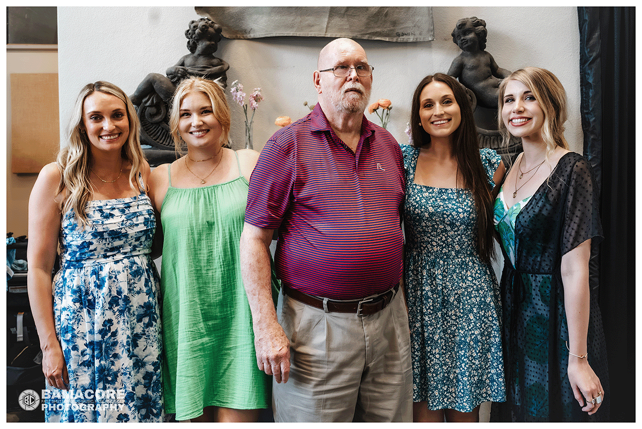 grandfather with granddaughters