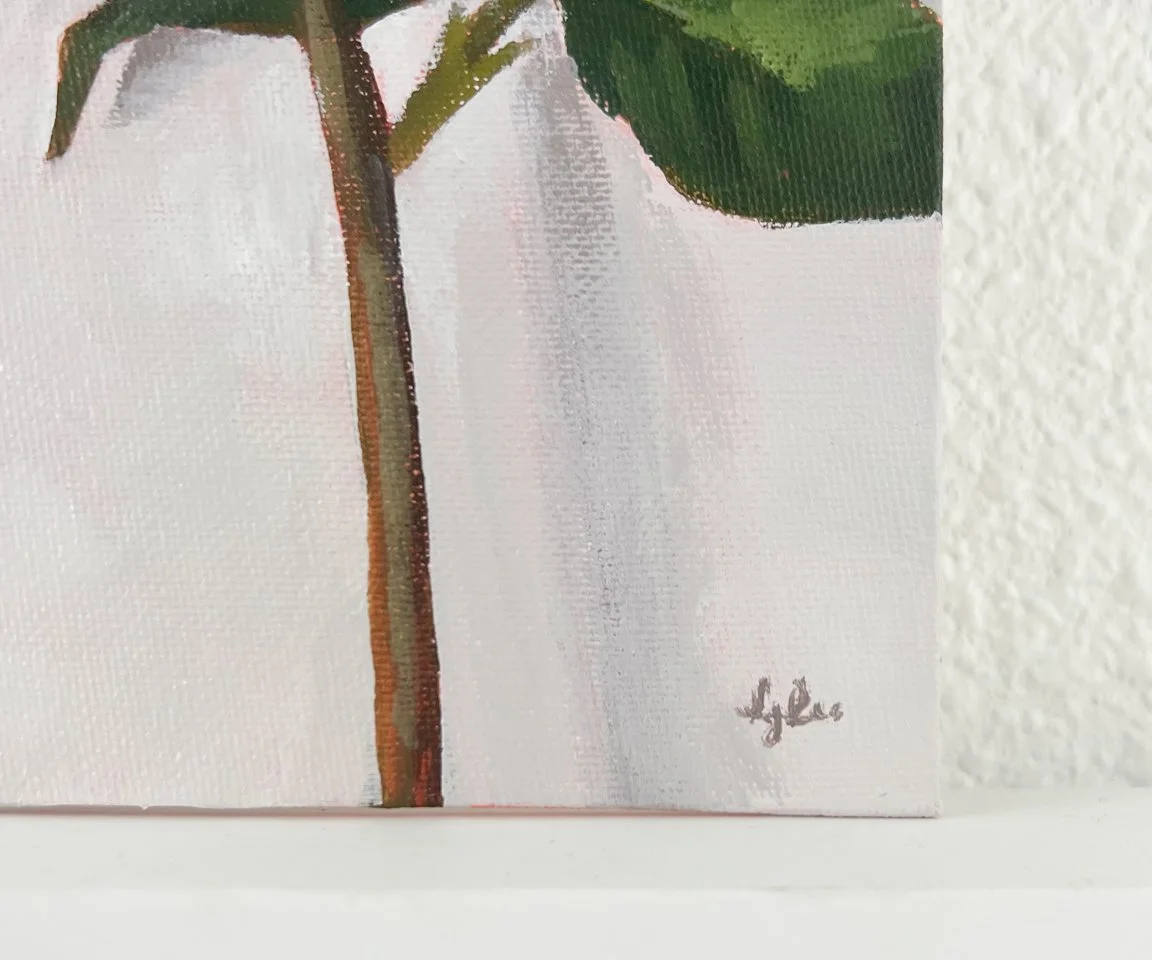 detail image of artist signature on white