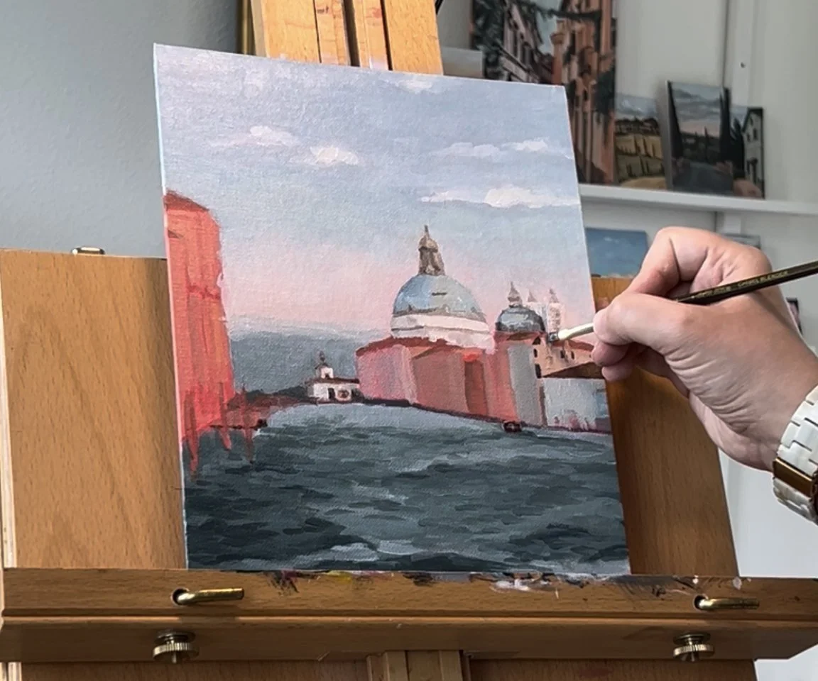 in progress photo of picture being painted on easel