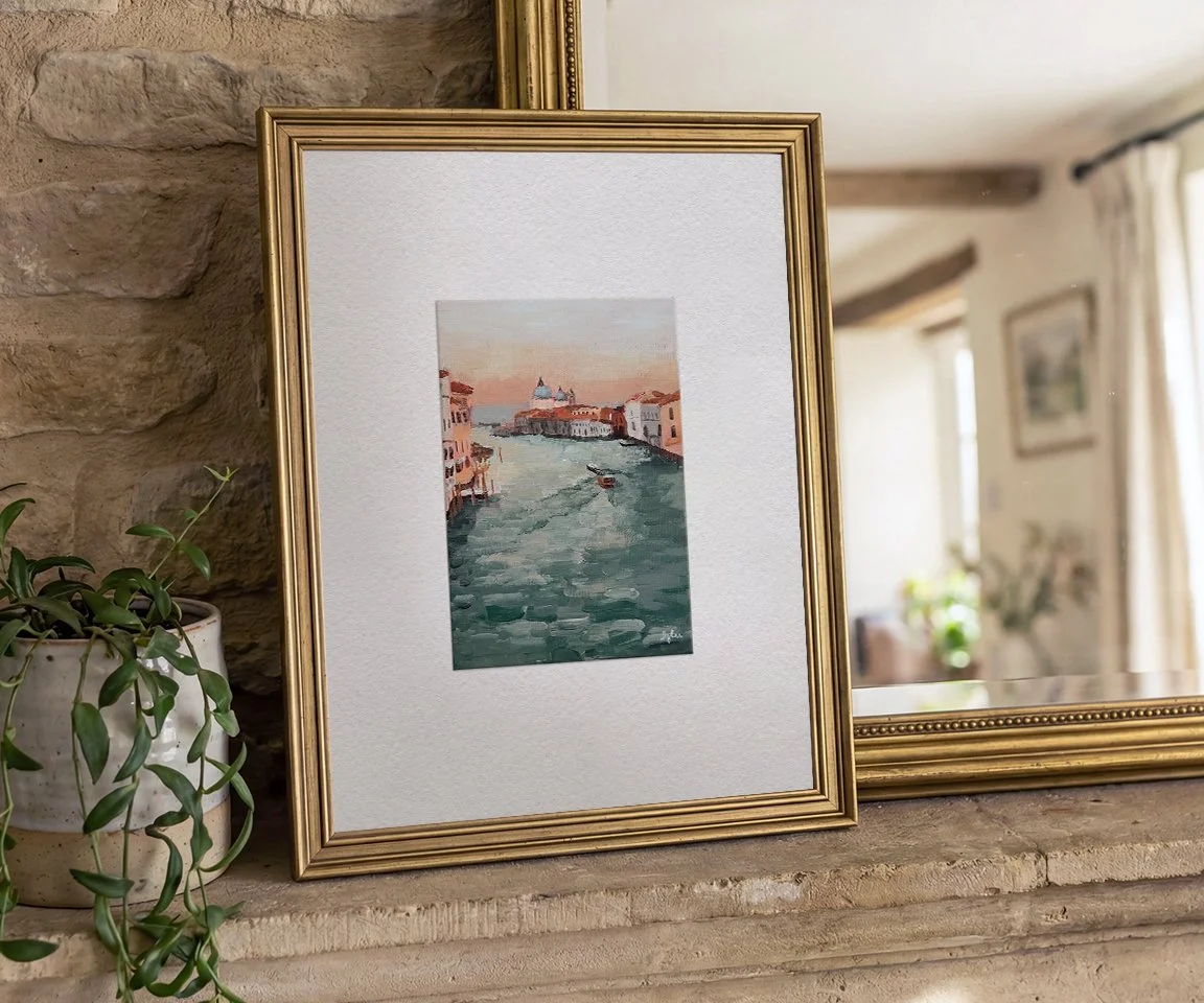 oversized frame with 5x7 sunset over Venice painting on mantle