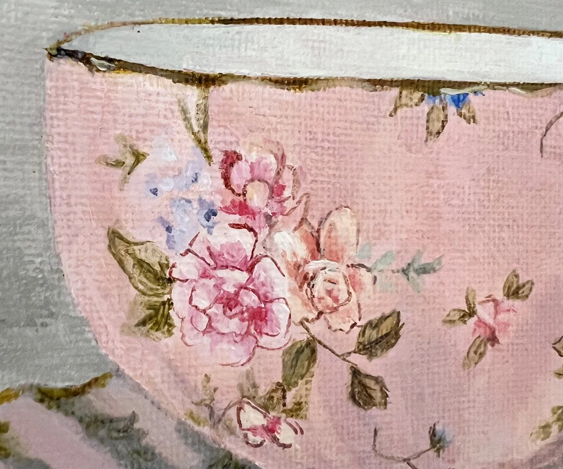 detail image of flower bouquet on pink teacup