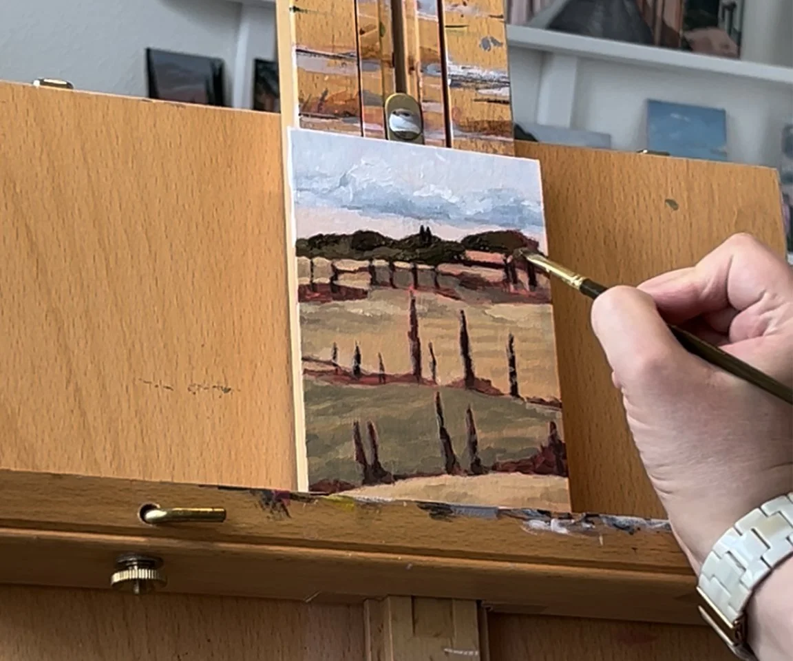 Italy countryside painting in progress on easel