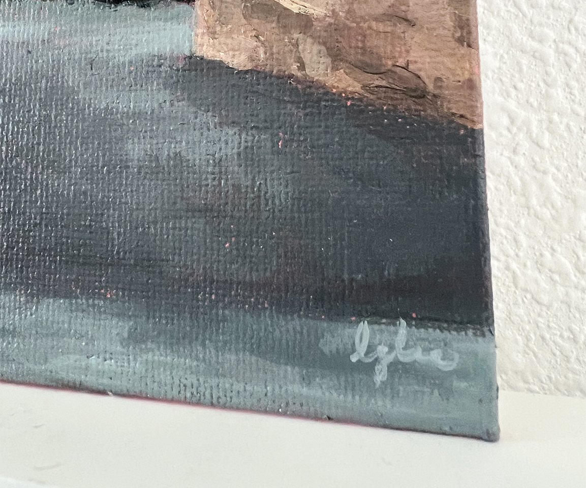 detail image of artist signature on gray