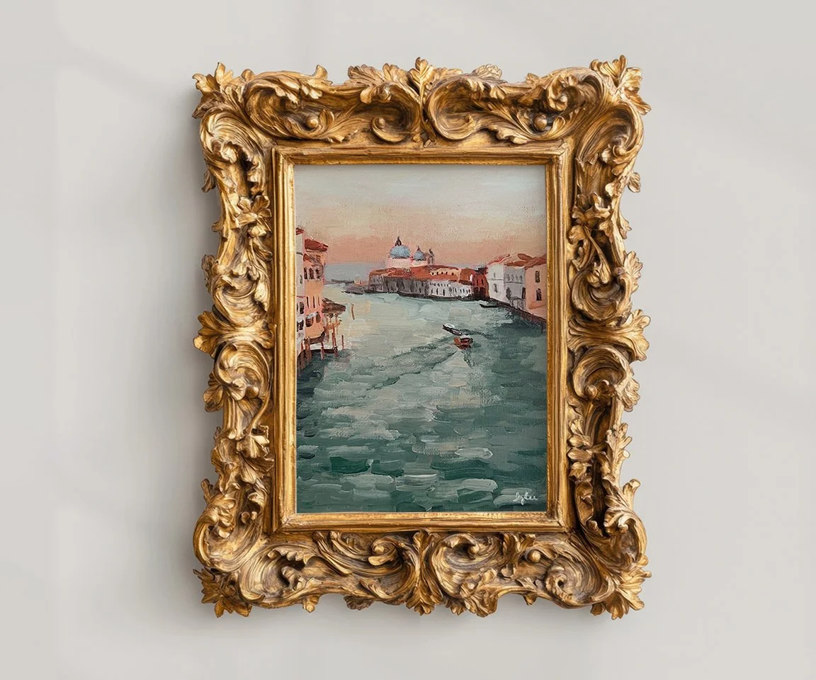 gold ornate frame framing print of canal painting