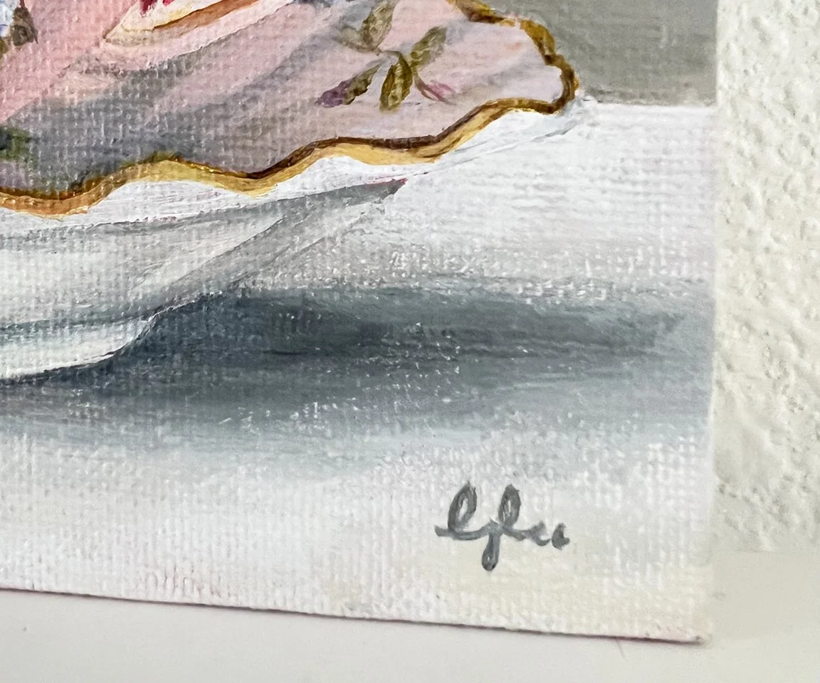 detail image of artist signature on white