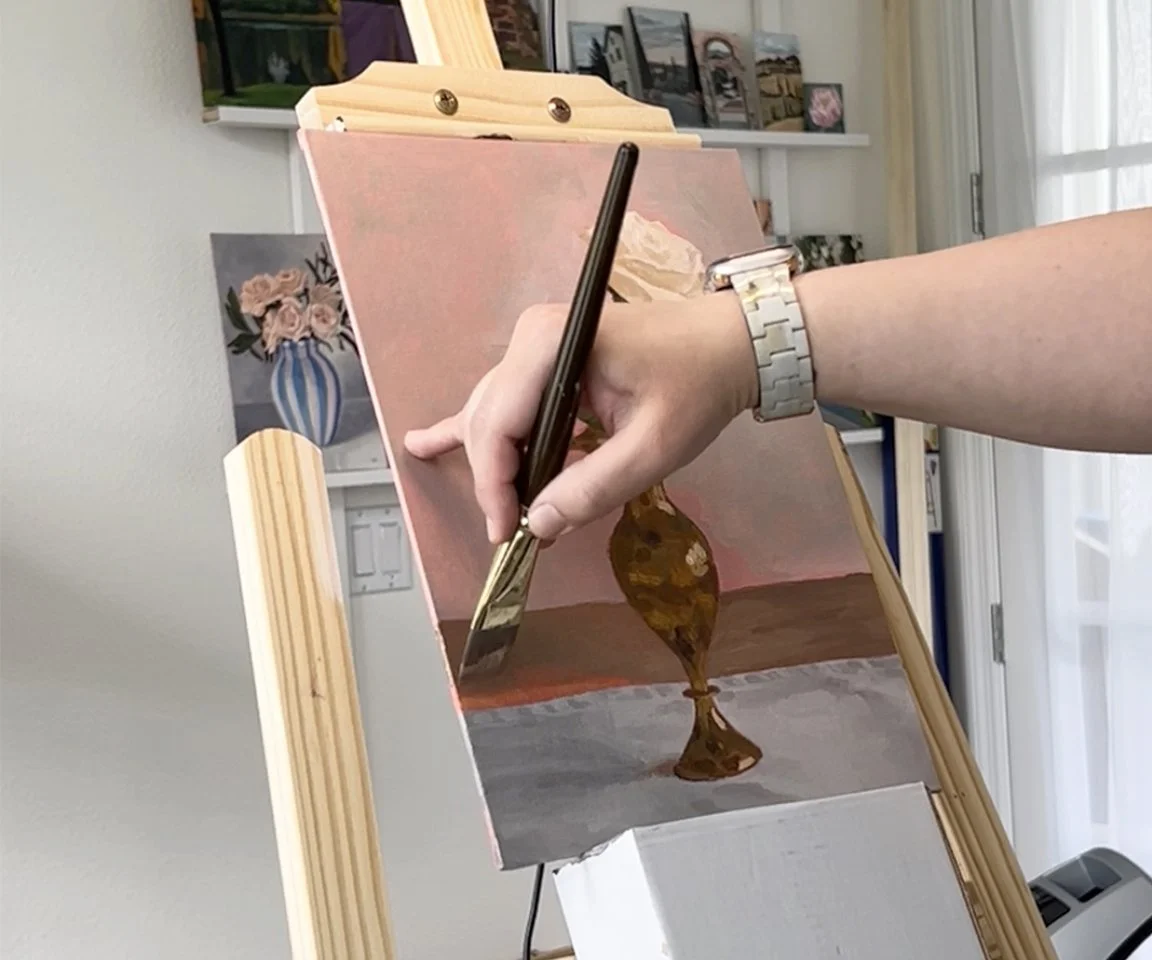 painting of rose in bud vase in progress by artist