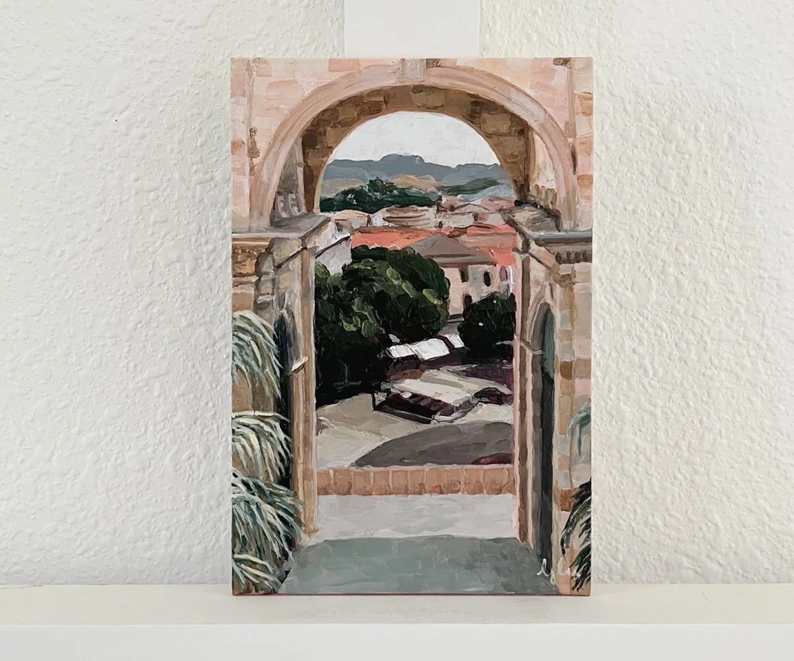 Painting of archway looking over piazza