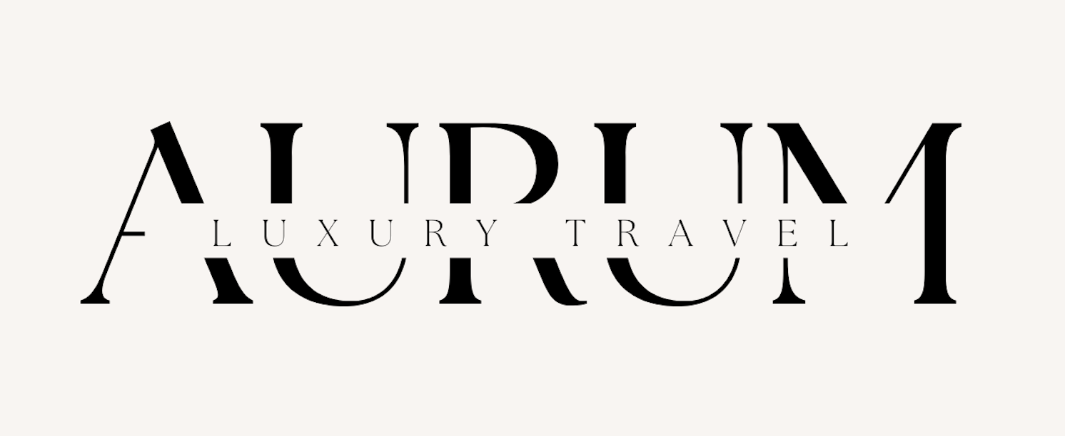 Luxury Travel logo with stylized text on a white background.