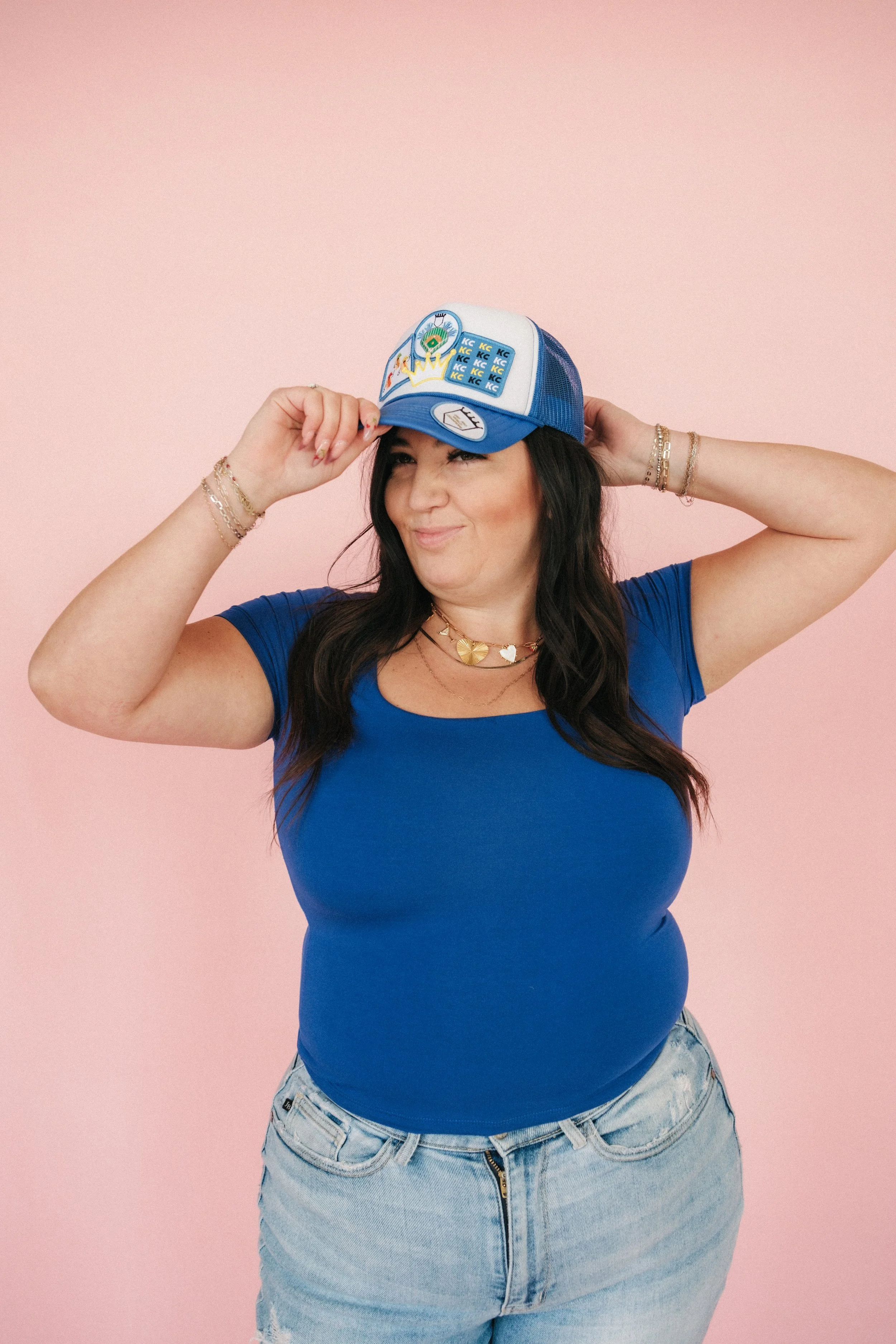  Brand photography of a woman wearing a custom hat. 