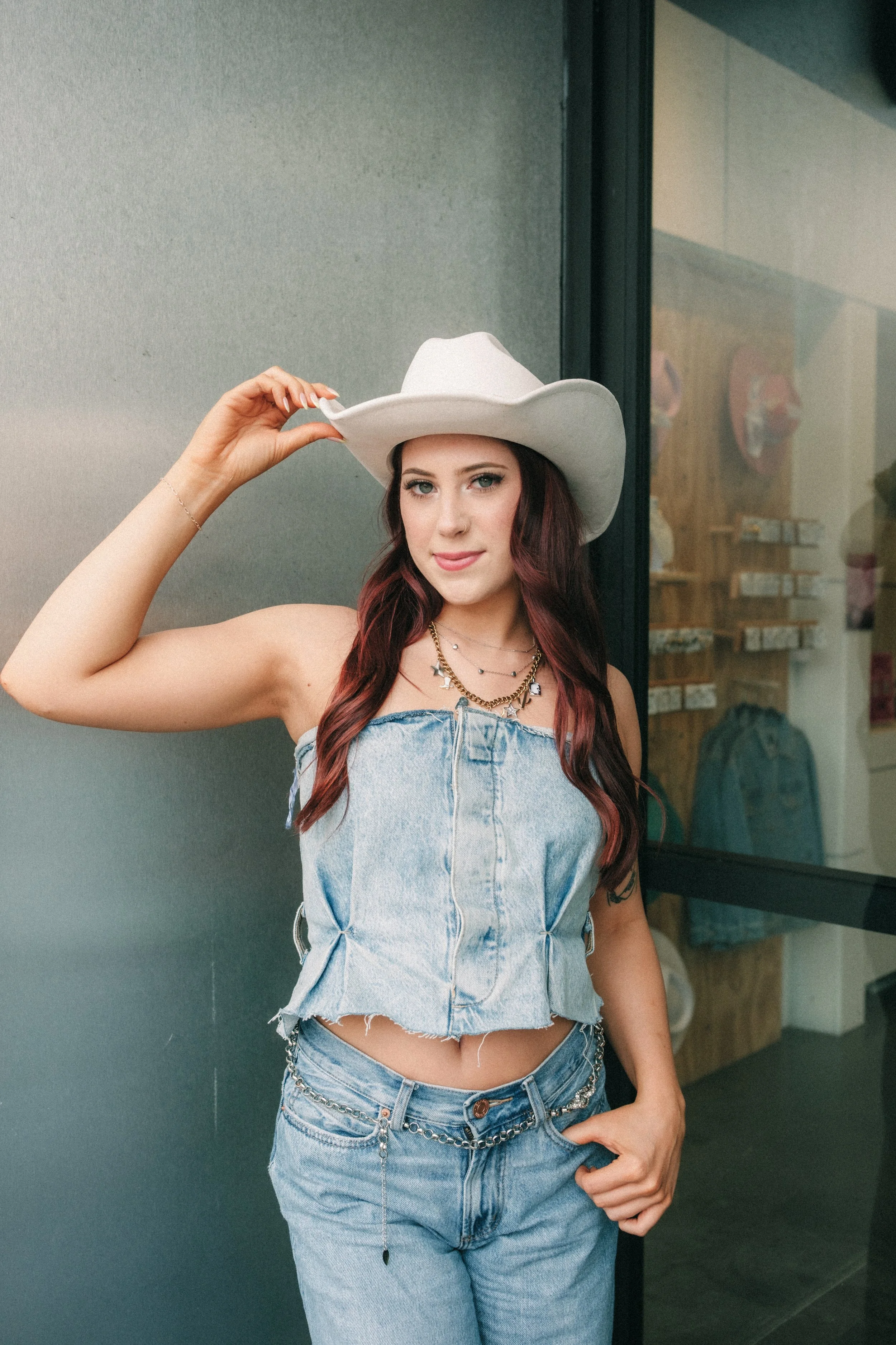 Brand photography of a girl wearing a cute outfit and accessories.