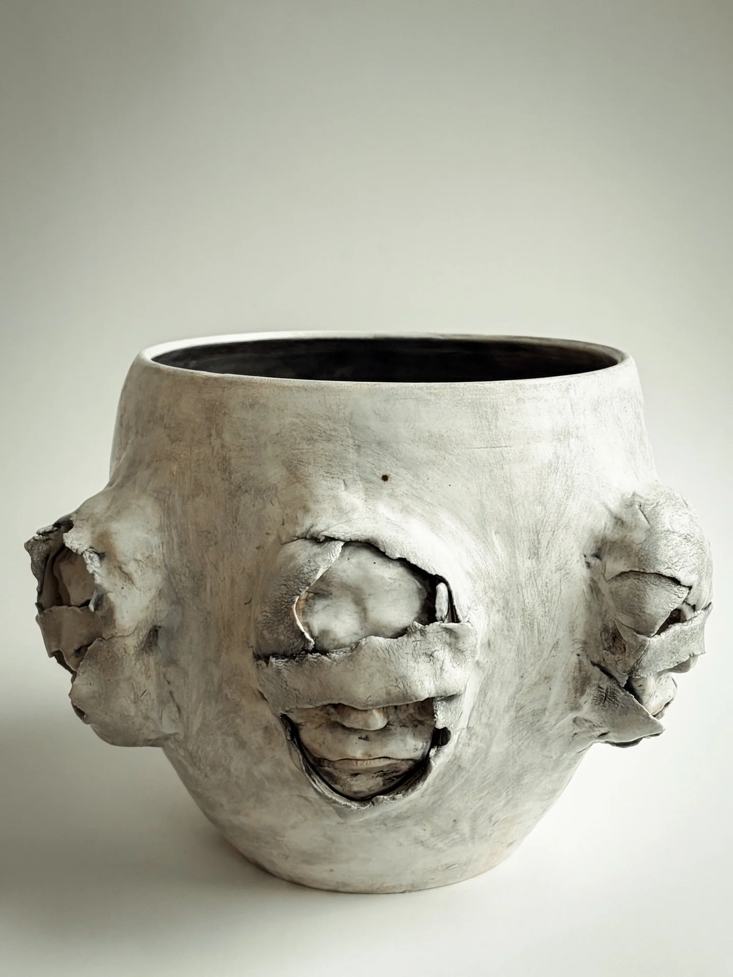 Honoured to be exhibiting in the Henry Goodman Emerging Artist Exhibition.

This work considers gathering as something that builds over time, where past, present, and future come together within a single form. Repeated faces wrap the surface, echoing