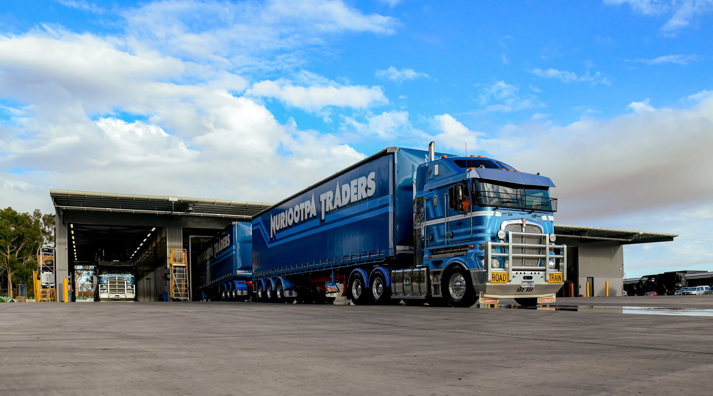 A large blue semi-truck at the Nuriootpa Traders depot.