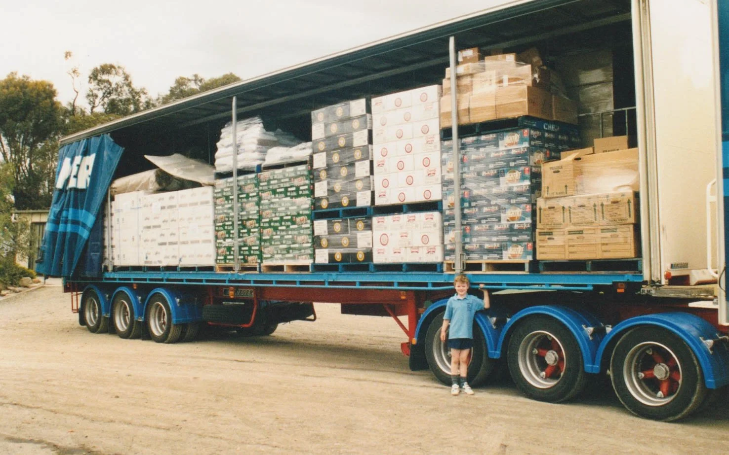 Luke Jaunay standing in front of a NT truck