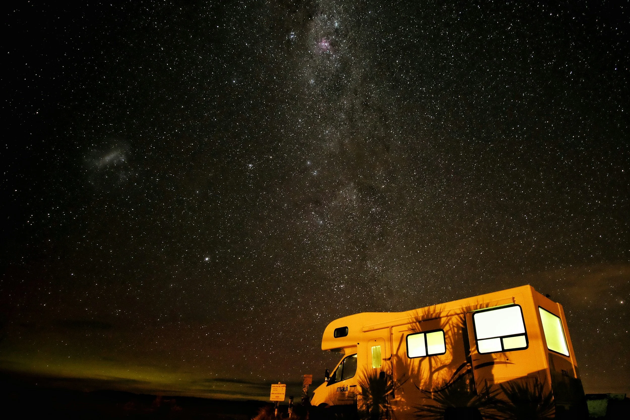 RV camp underneath a starlit sky