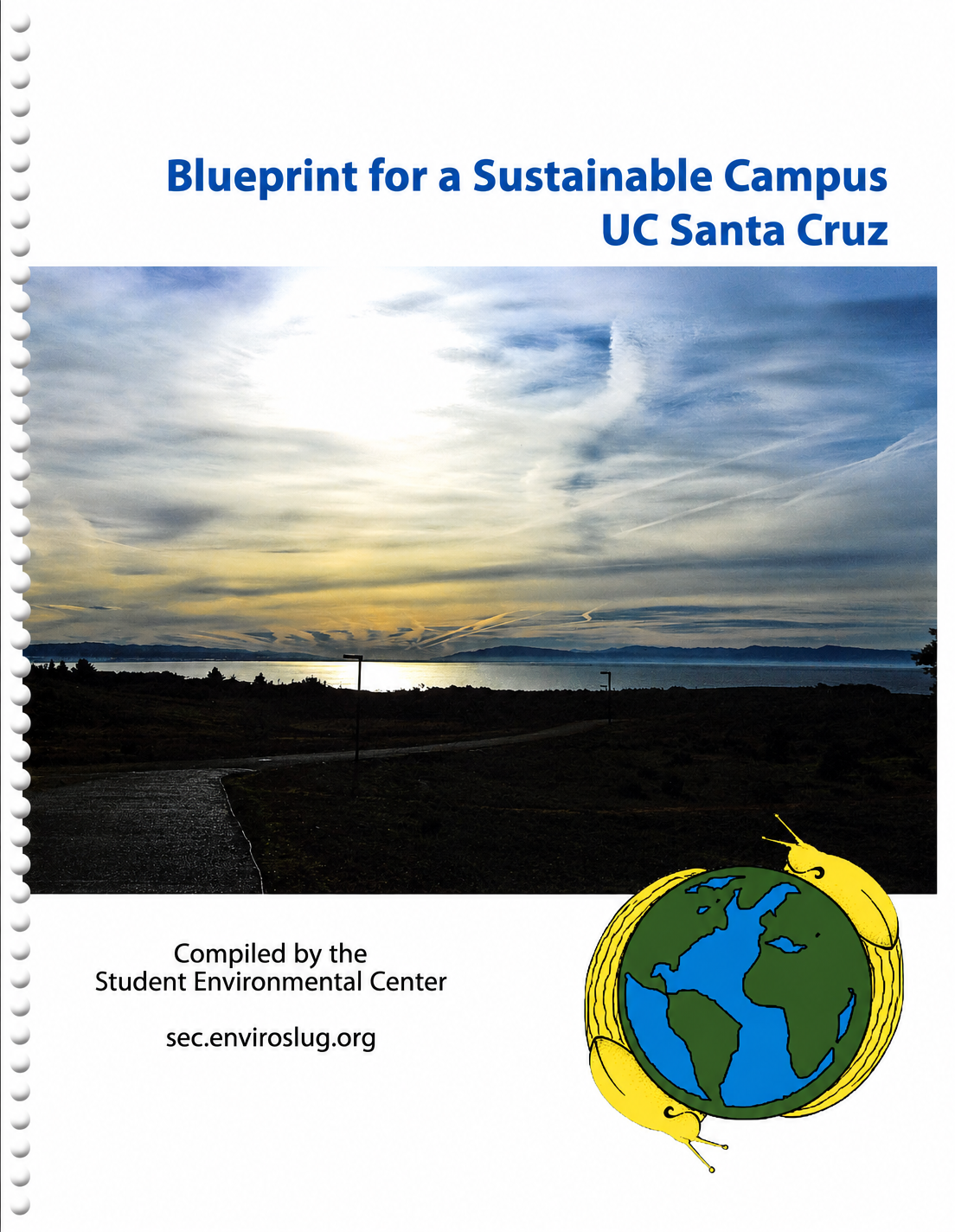 Cover of a report titled 'Blueprint for a Sustainable Campus UC Santa Cruz' with a landscape photograph showing a sunset over a body of water, with a pathway and some lampposts in the foreground, and an illustration of the Earth with a yellow outline in the bottom right corner.