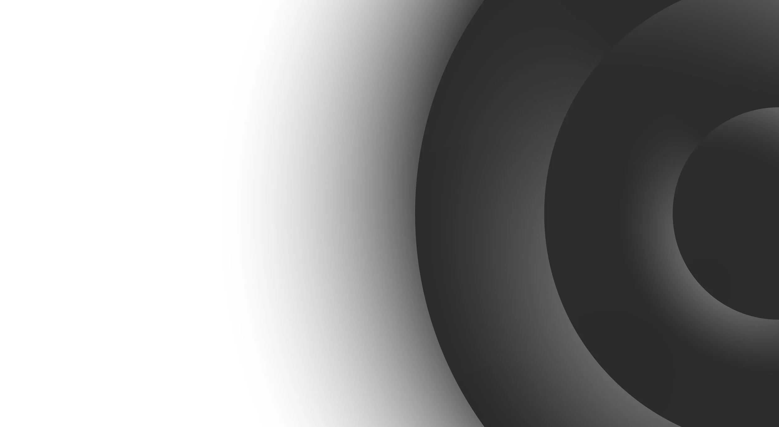 Abstract background with concentric circles in grayscale, fading from black on the right to white on the left.