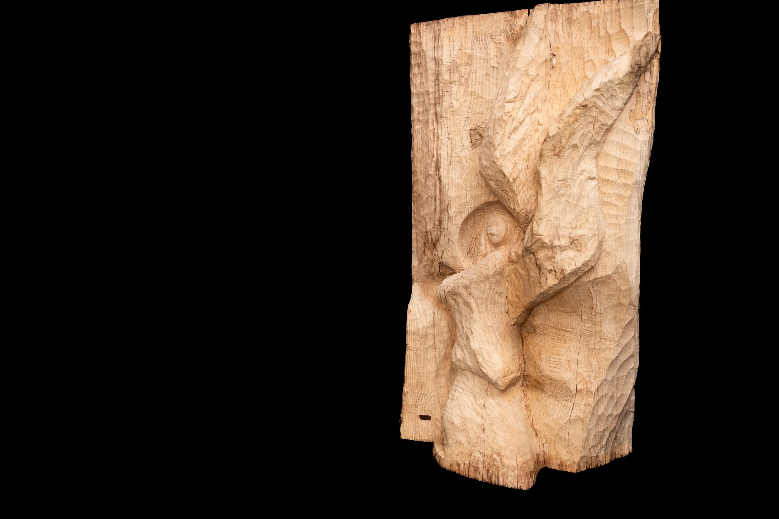 Oak carved log of an Angel carved by sculptor David Puustinen