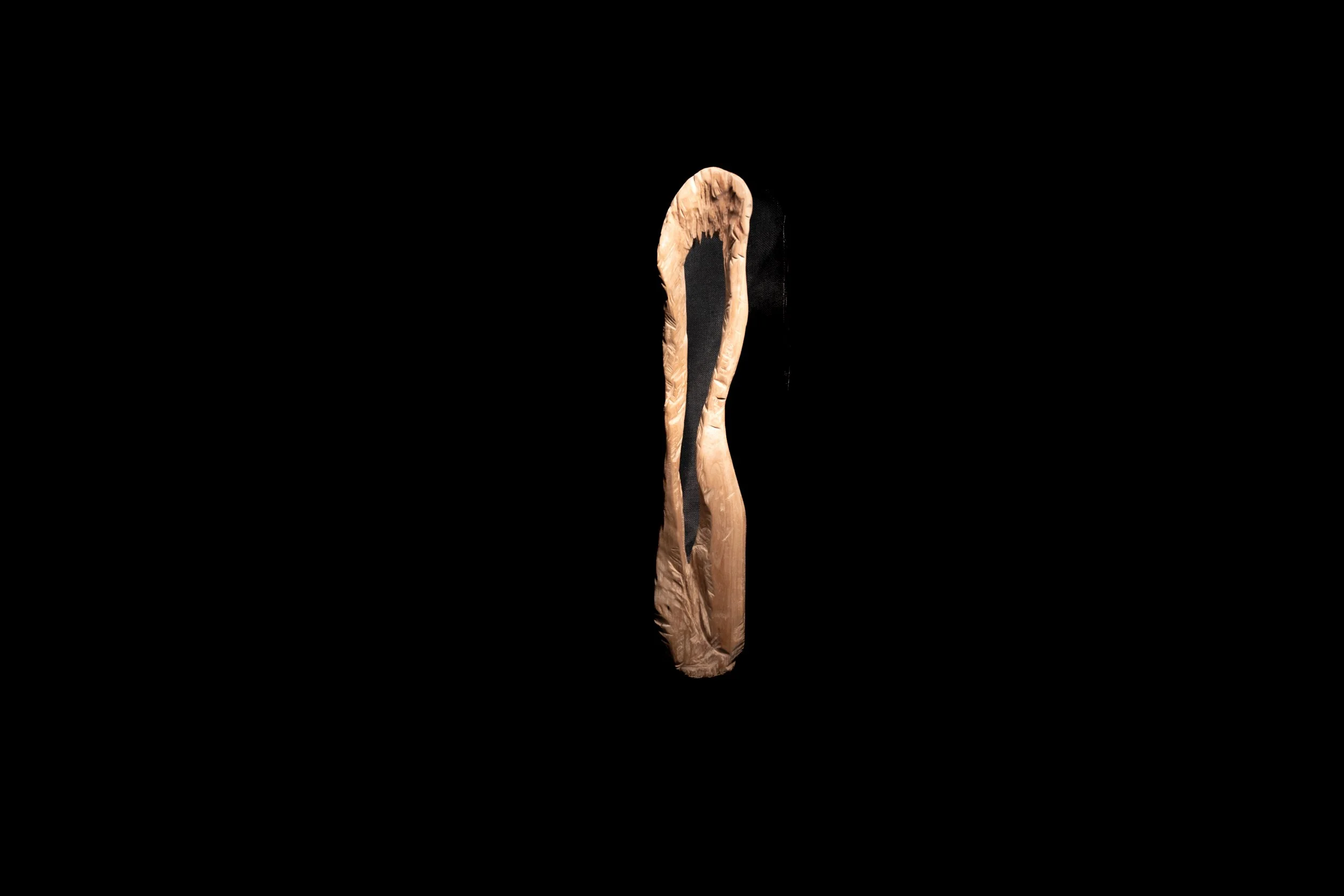 An open cut forn that exhibits wild and unabated cuts to suggest a very natural form. Created more with an instinct and spontaneity.