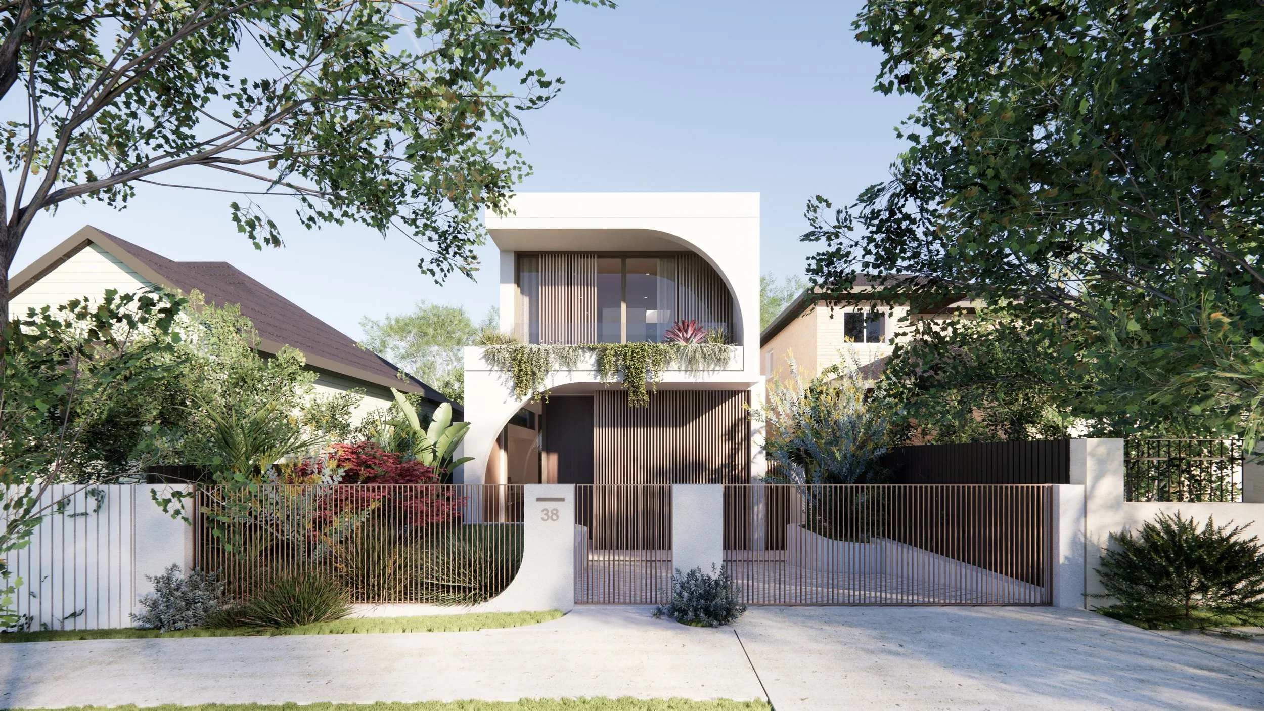 Modern two-story house with white and wood exterior, curved balcony with greenery, surrounded by lush trees and garden, with a gated front and house number 38.