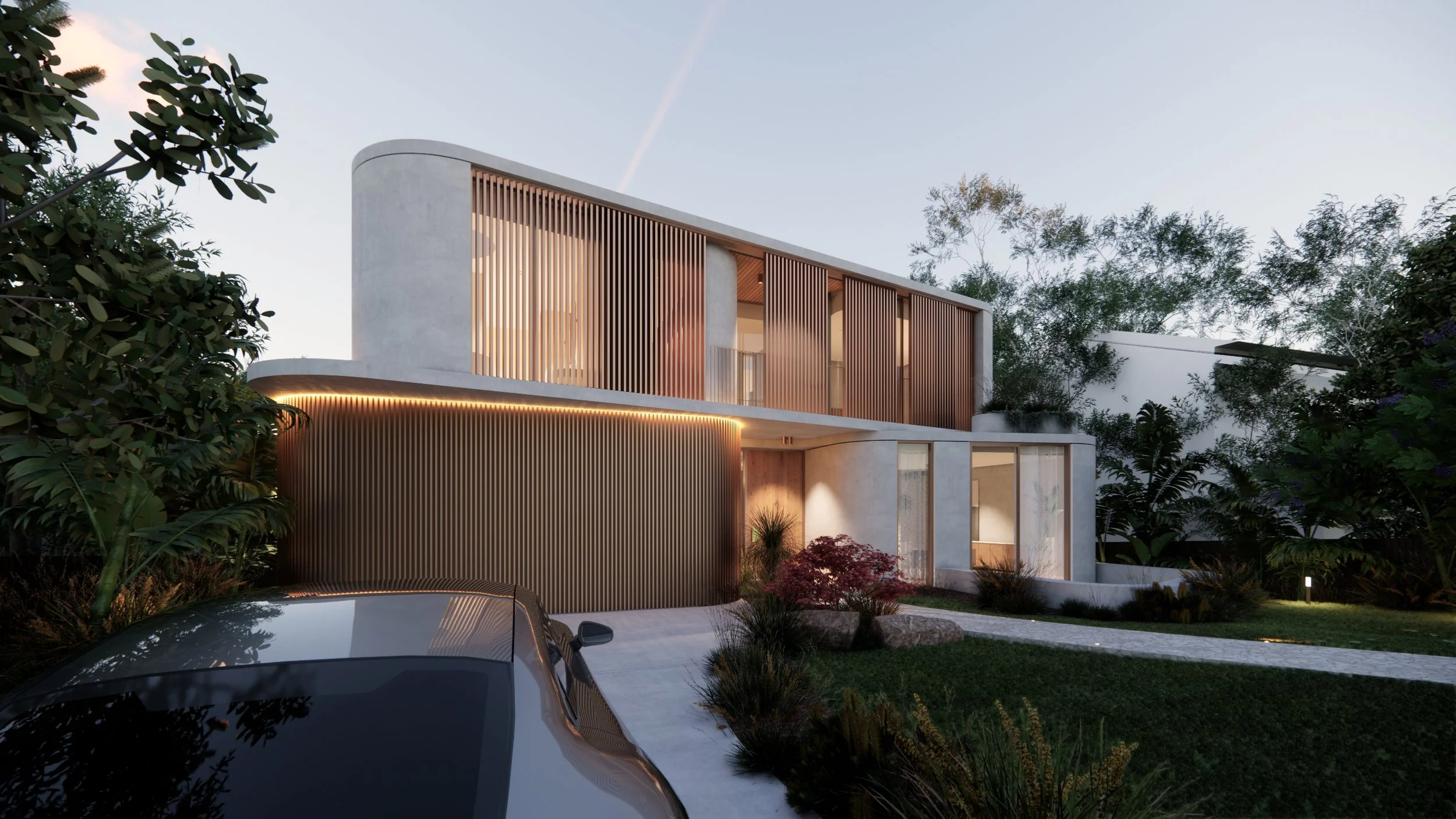 Modern two-story house with wooden slatted exterior, illuminated lighting accents, and landscaped front yard with bushes, trees, and a parked car.