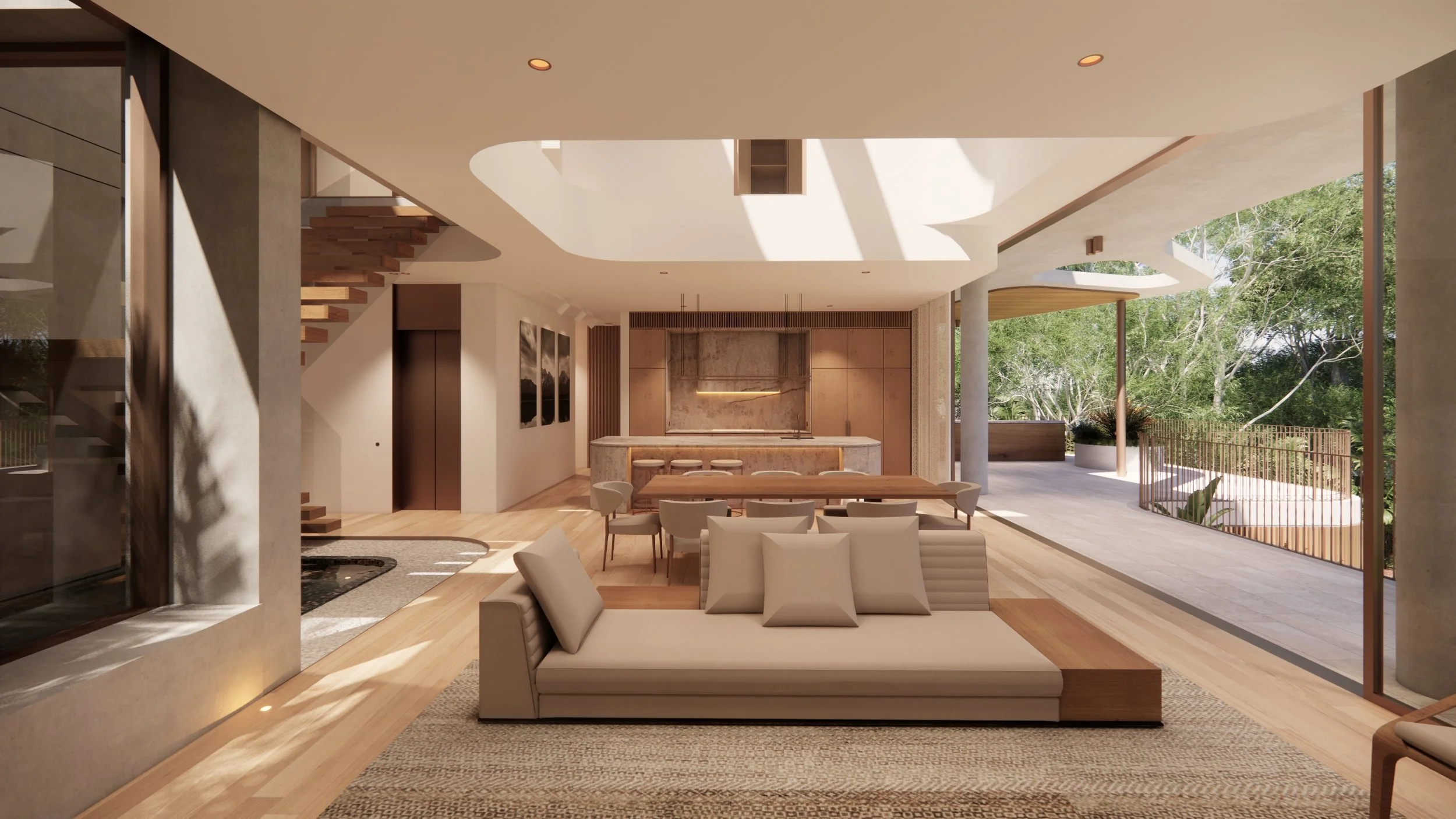 Modern open-concept living room with beige furniture, wooden dining table, and a kitchen with a marble island. Large glass sliding doors open to a patio with a view of trees outside.