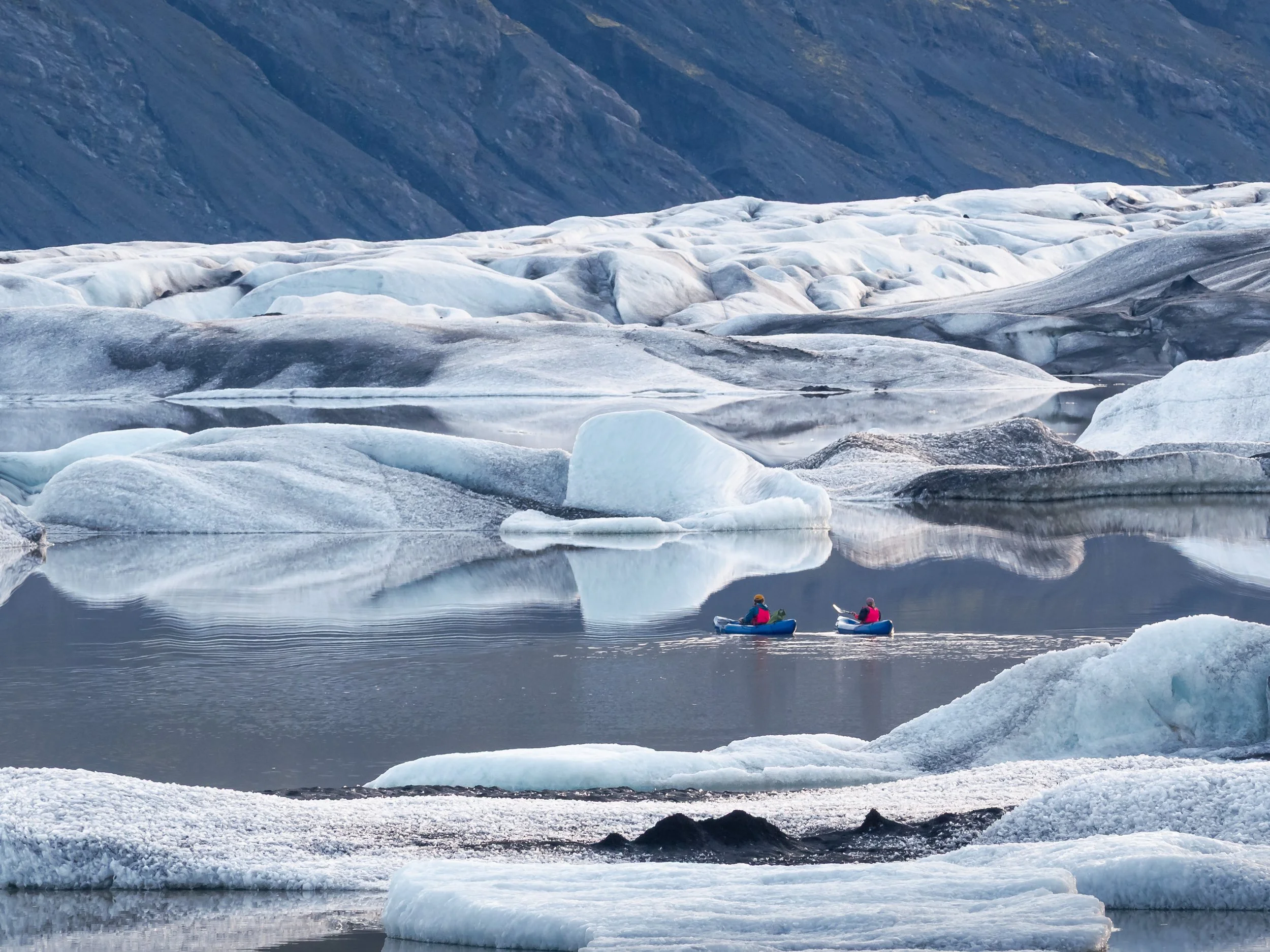 Kayaking in a hidden glacier lagoon Heinabersglón