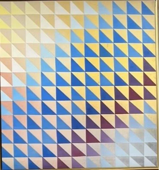 A colorful geometric pattern composed of small triangles in shades of yellow, blue, and purple arranged in a grid.