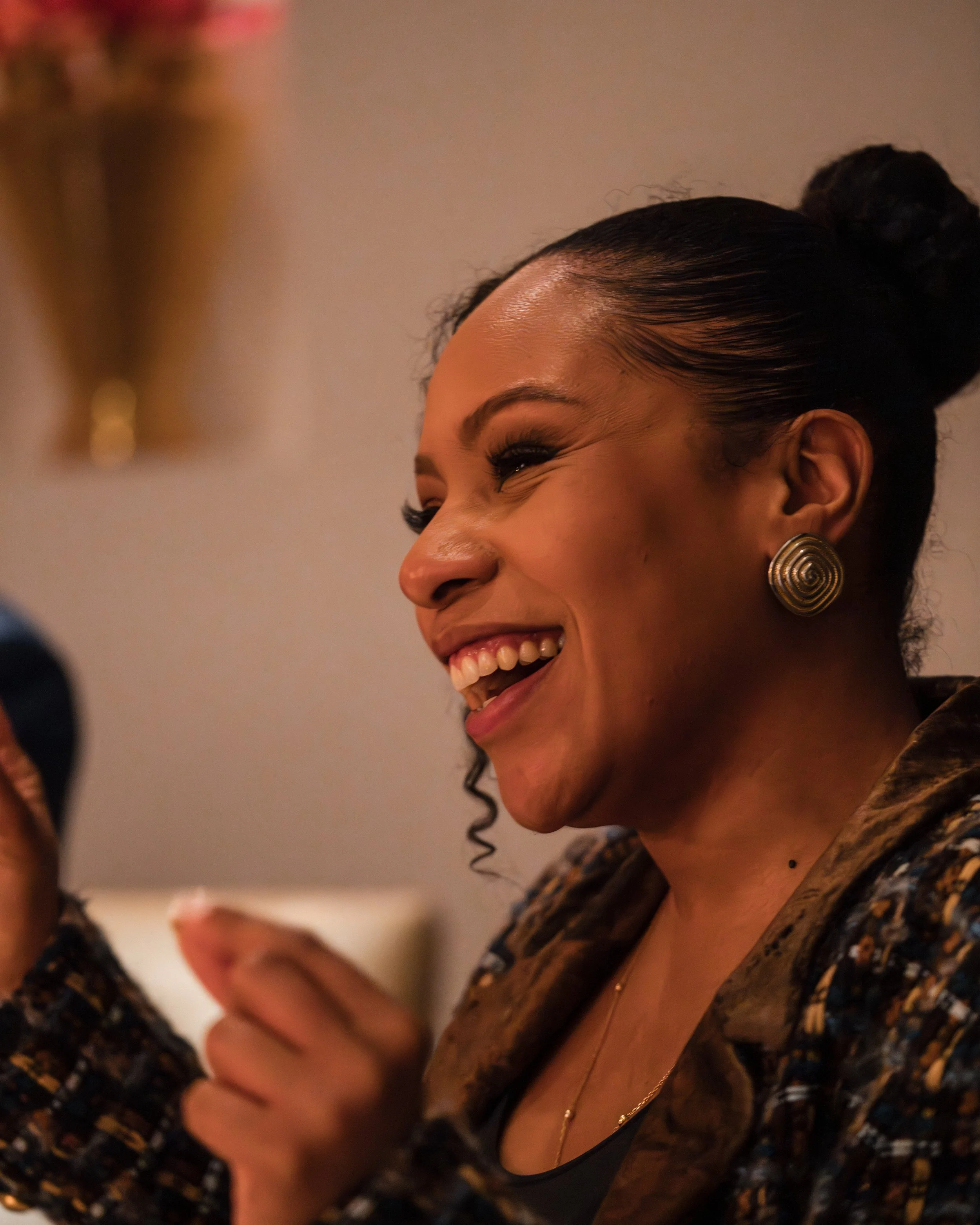 The Main Ingredients Founder Anais ATTICOT DIT RAVINO laughing during dinner at Calla's Michelin Star Restaurant in The Hague Netherlands