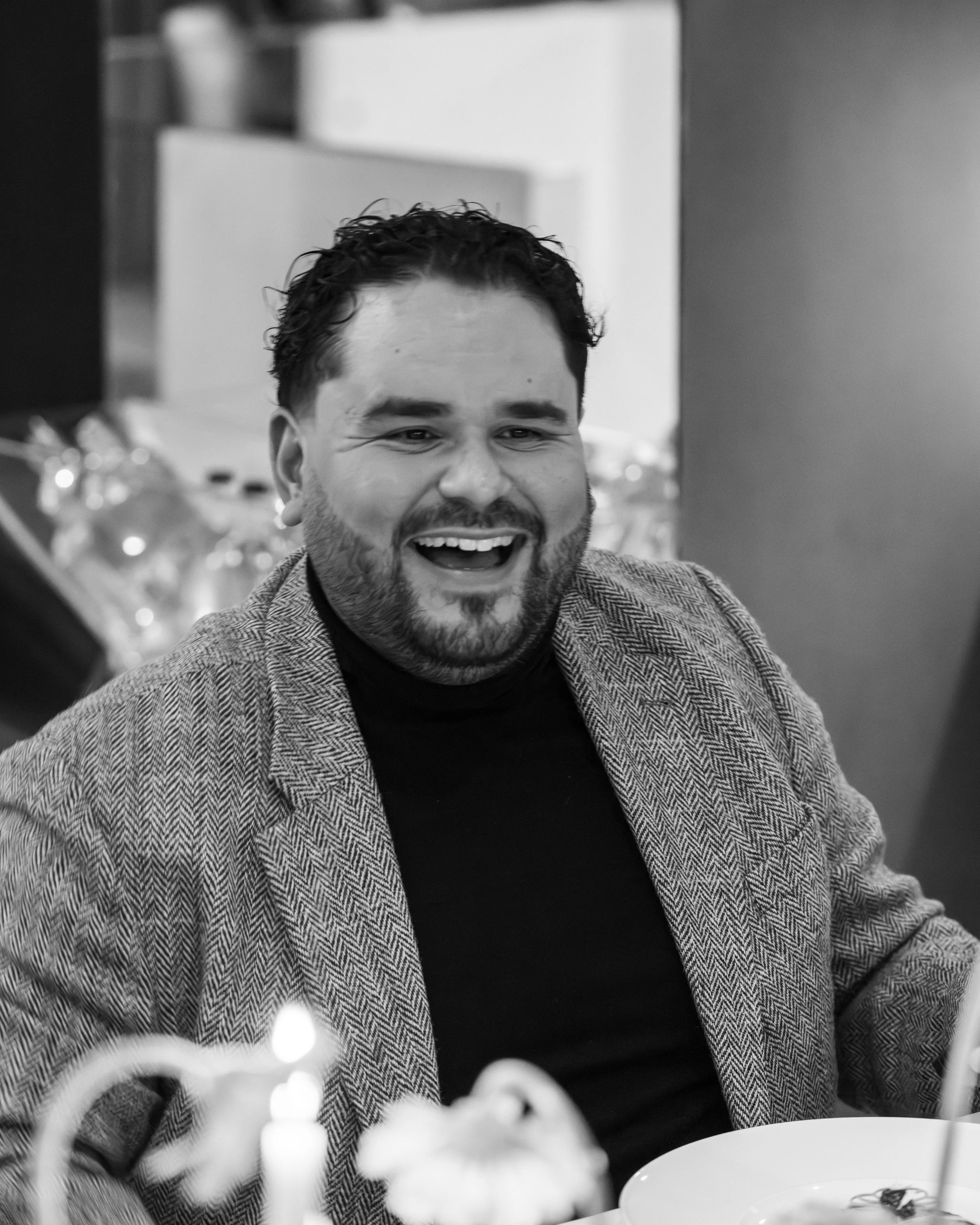 O'neal Jakaemo laughing at The Main Ingredients dinner table for event with Calla's Michelin Star Restaurant in The Hague Netherlands