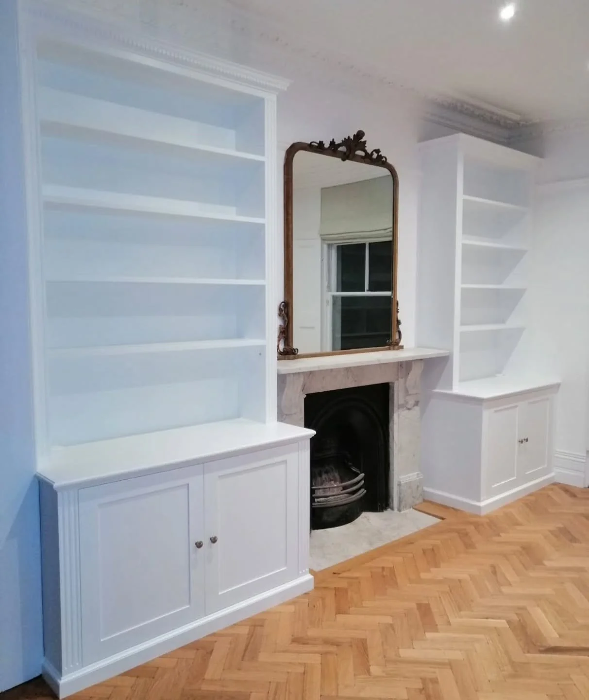 Simplicity done beautifully.
These bespoke alcove units were designed to bring balance and purpose to an underused space &mdash; framing the fireplace with clean lines, subtle detailing, and timeless proportions. Good joinery should seamlessly blend 