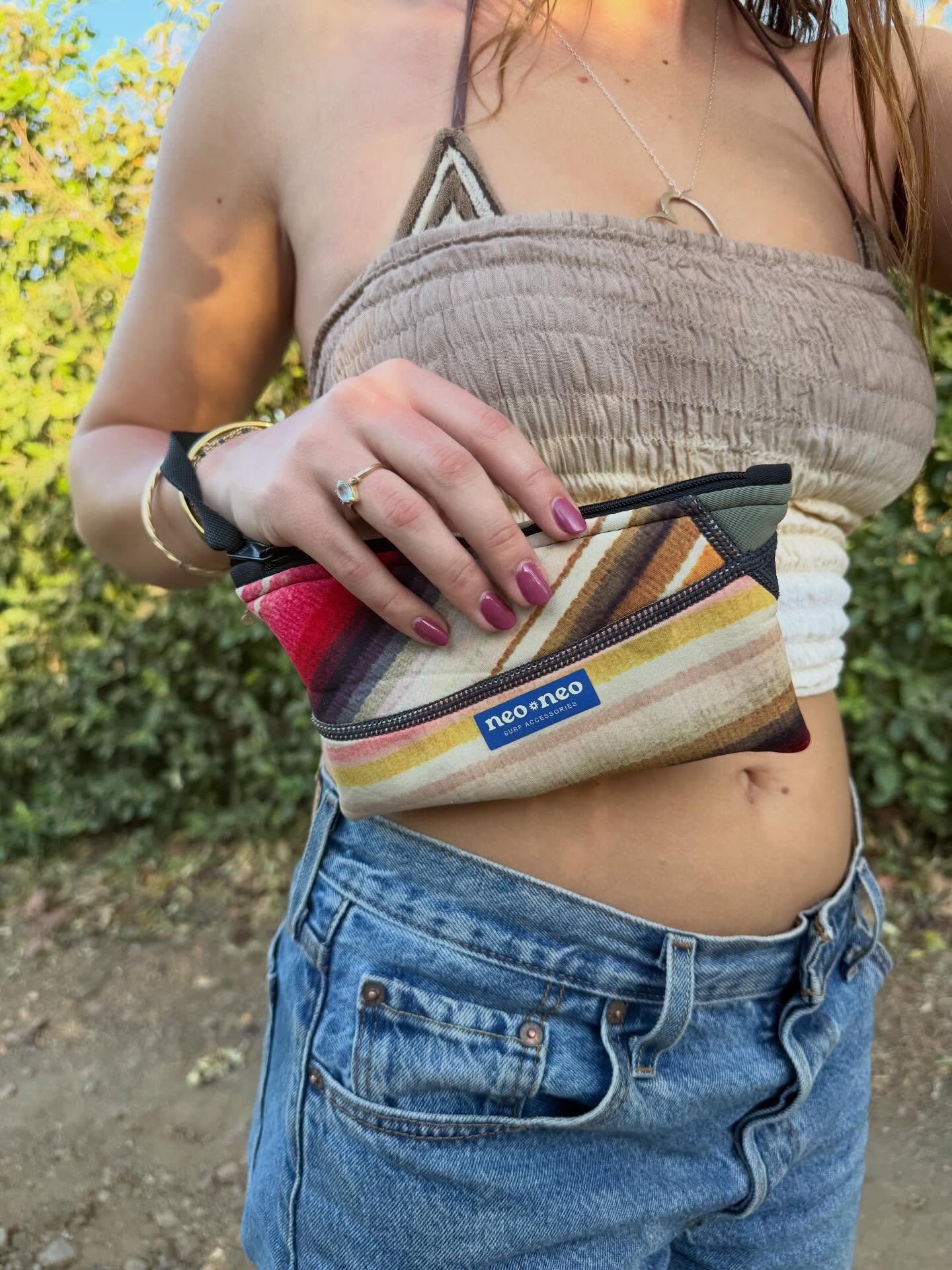 @lolagarneau repping the beach pouch in costa rica!! 🇨🇷 

even the pups want one🙃

#recycledfashion♻️ #womenonwaves 
#whereintheworldwednesdays