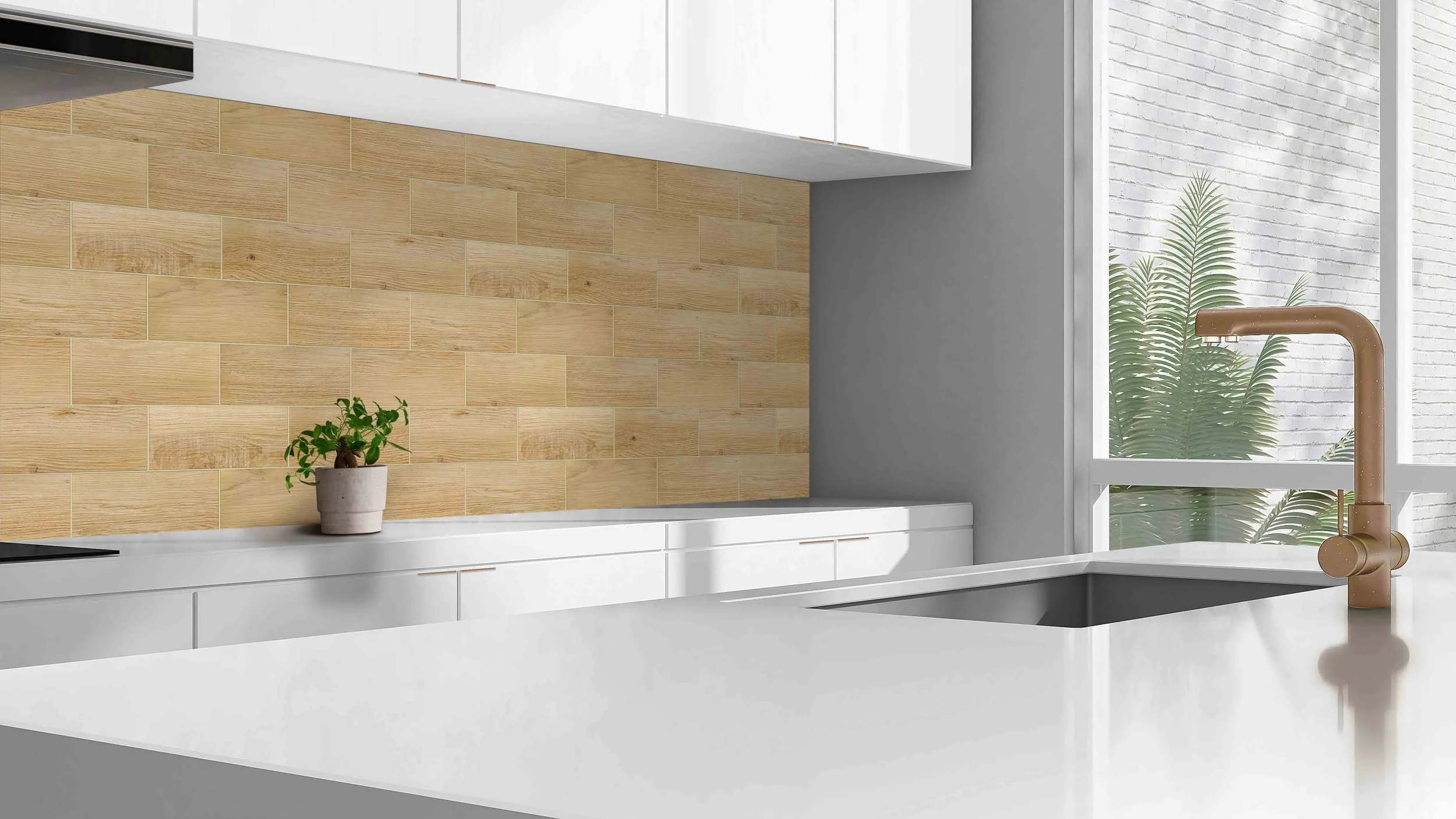 Modern kitchen with white countertops, a gold faucet, a potted plant on the counter, Natural Oak DuraWall blacksplash tile walls, and large windows with a view of greenery outside.