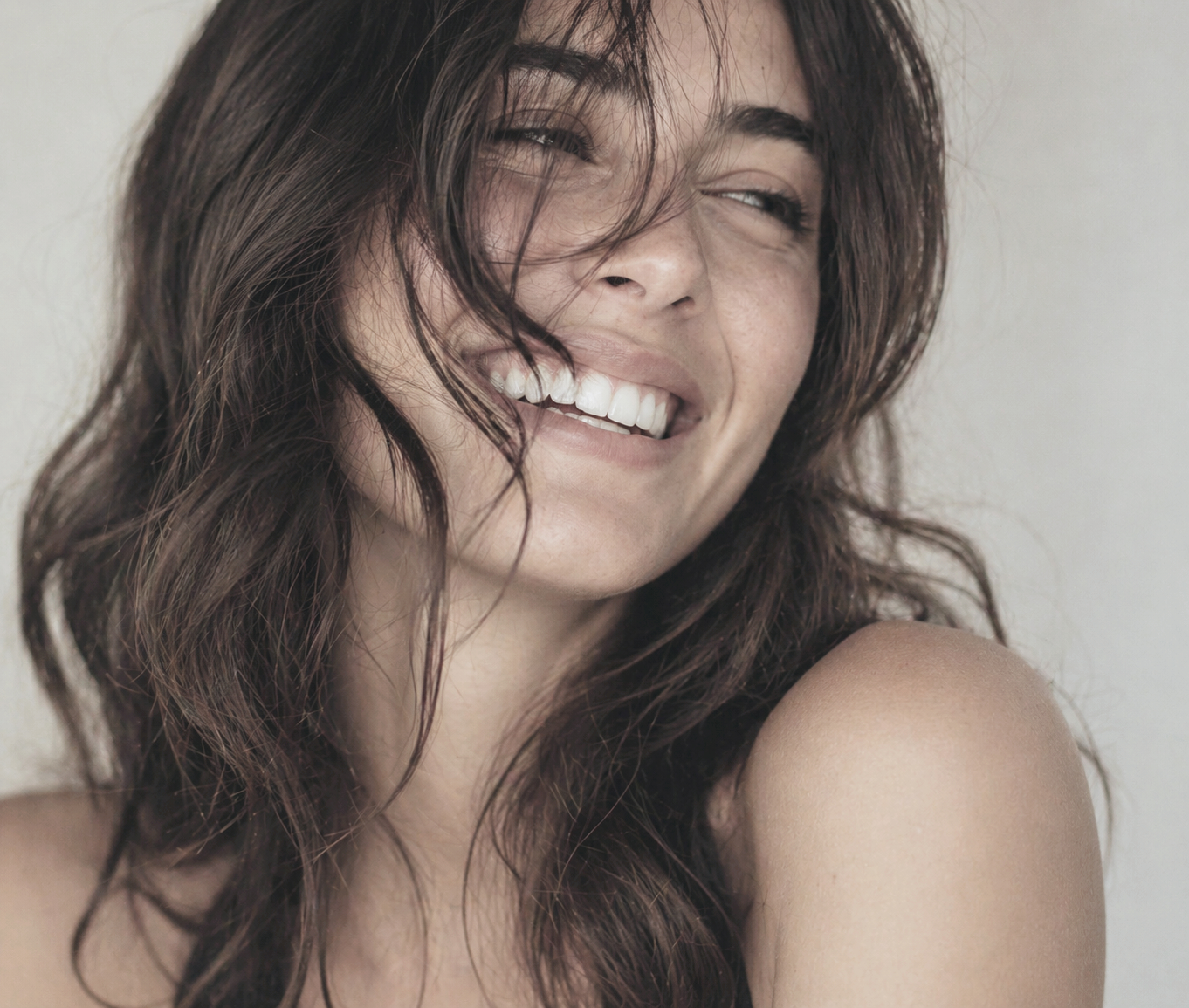 woman smiling long brown hair