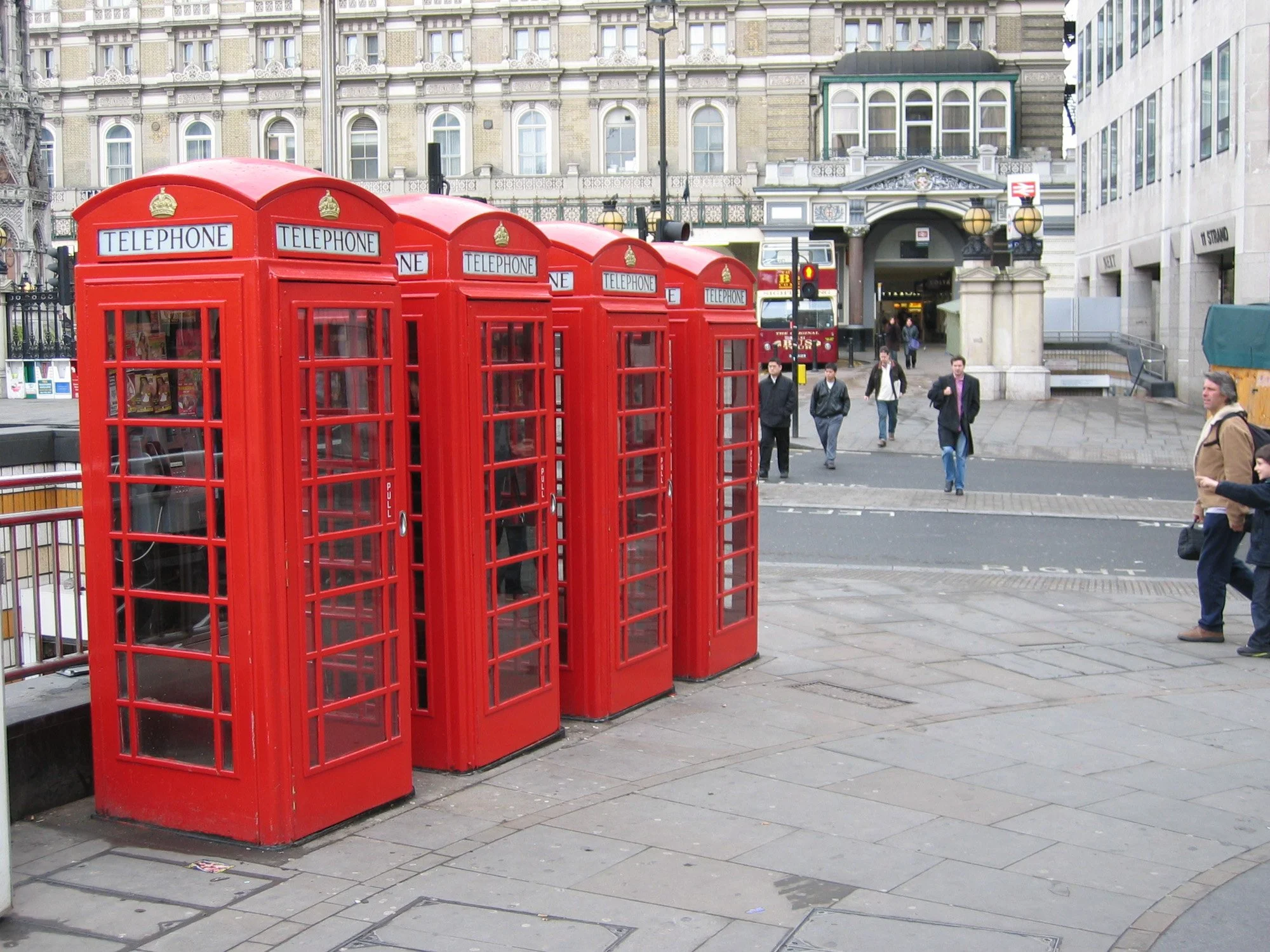 Four red London phone boxes