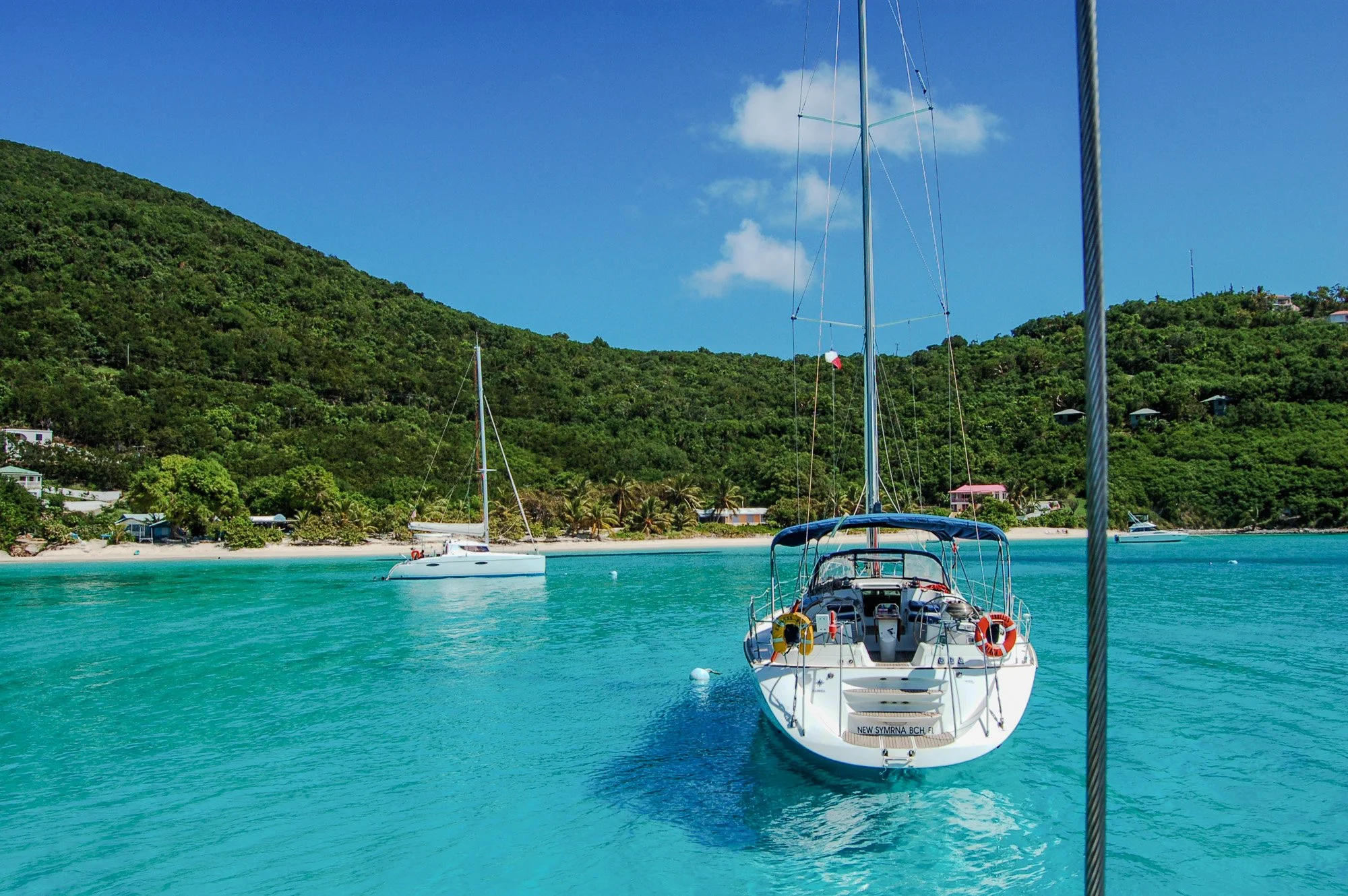 A yacht on a crystal clear sea in the British Virgin Islands