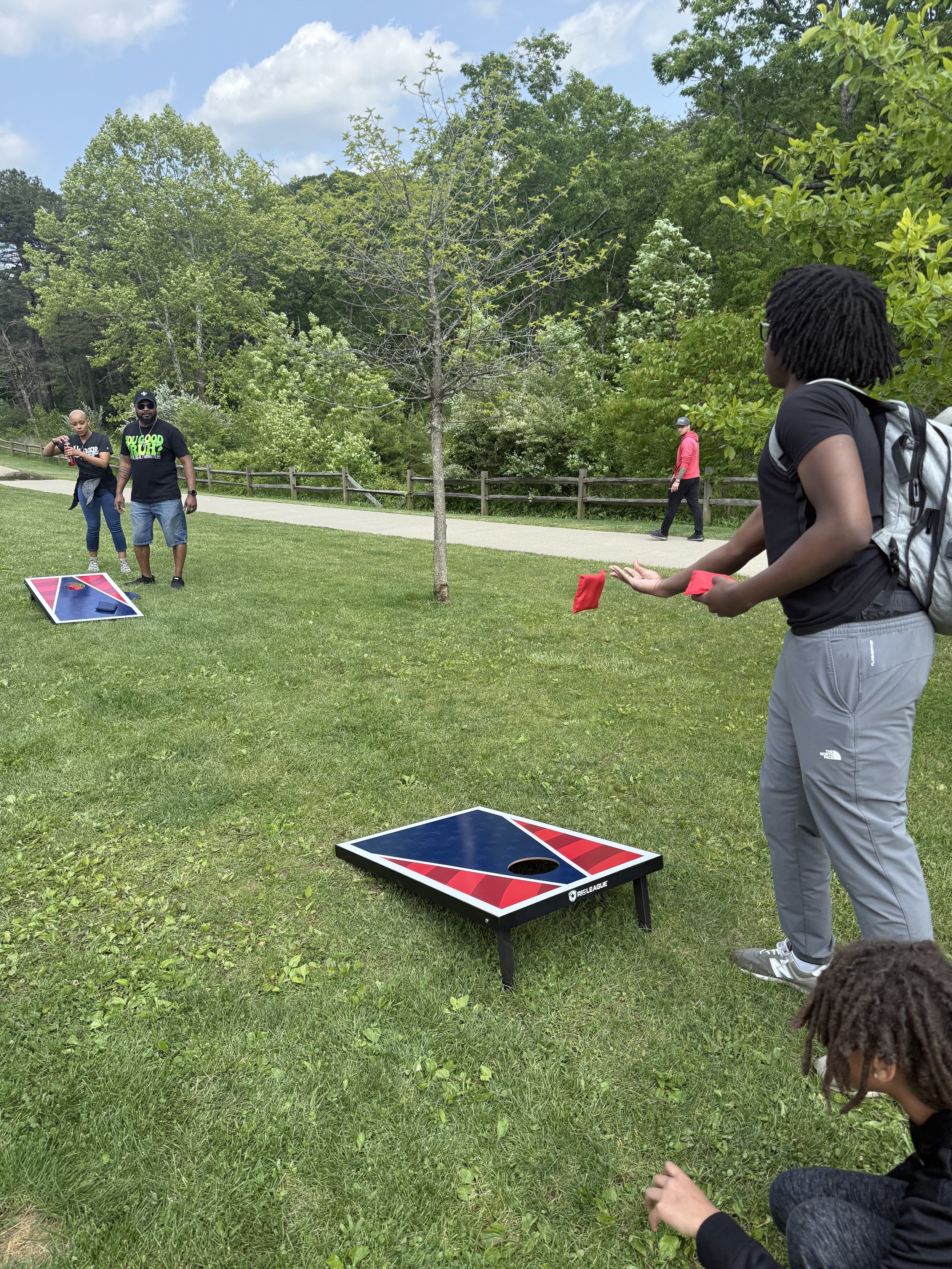 MMHU Youth playing cornhole