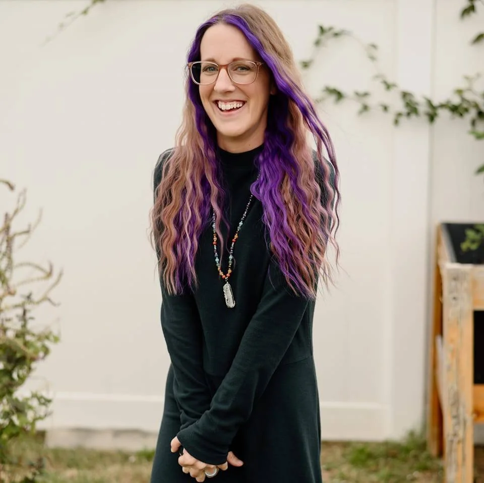 Kat Harrison, founder of Soulful Expressions, smiling and connecting with viewers.