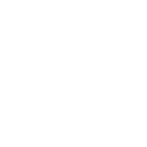 Line drawing of a massage table with folded towels resting on top.