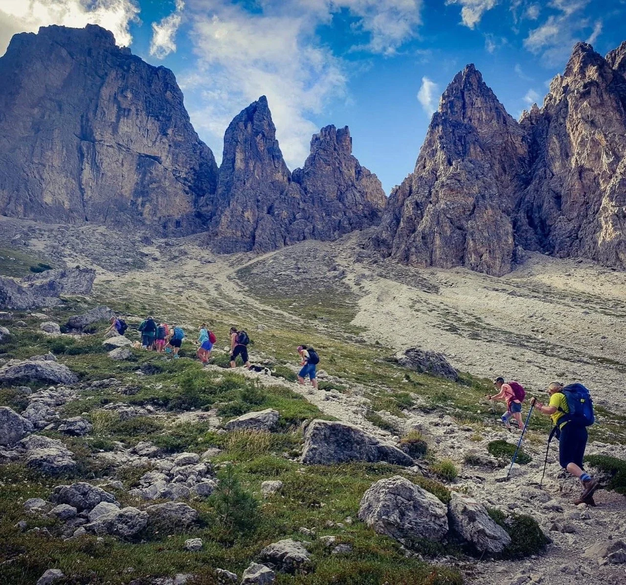 Group of hikers looking at scenic mountain view